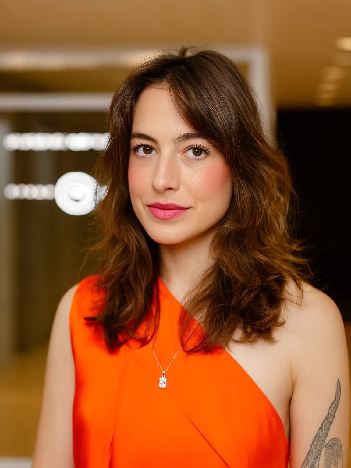 Medium-Length Wavy Layers with Curtain Bangs