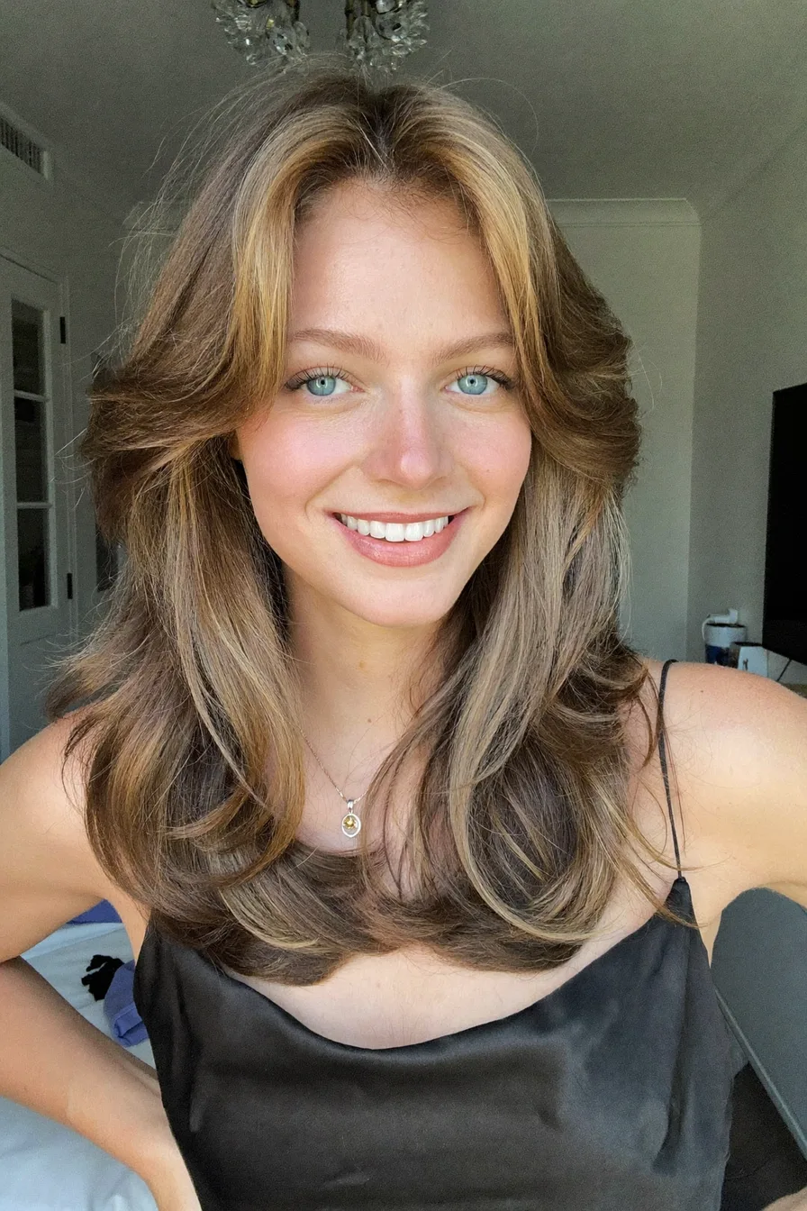 Layered Caramel Brown Blowout with Face-Framing Highlights