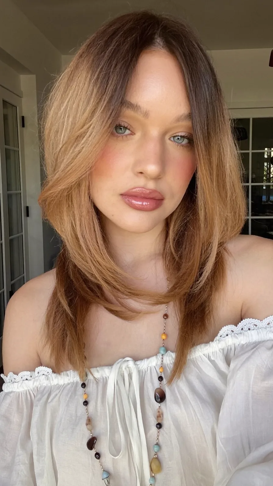 Soft Layered Medium Cut with Warm Caramel Balayage Highlights