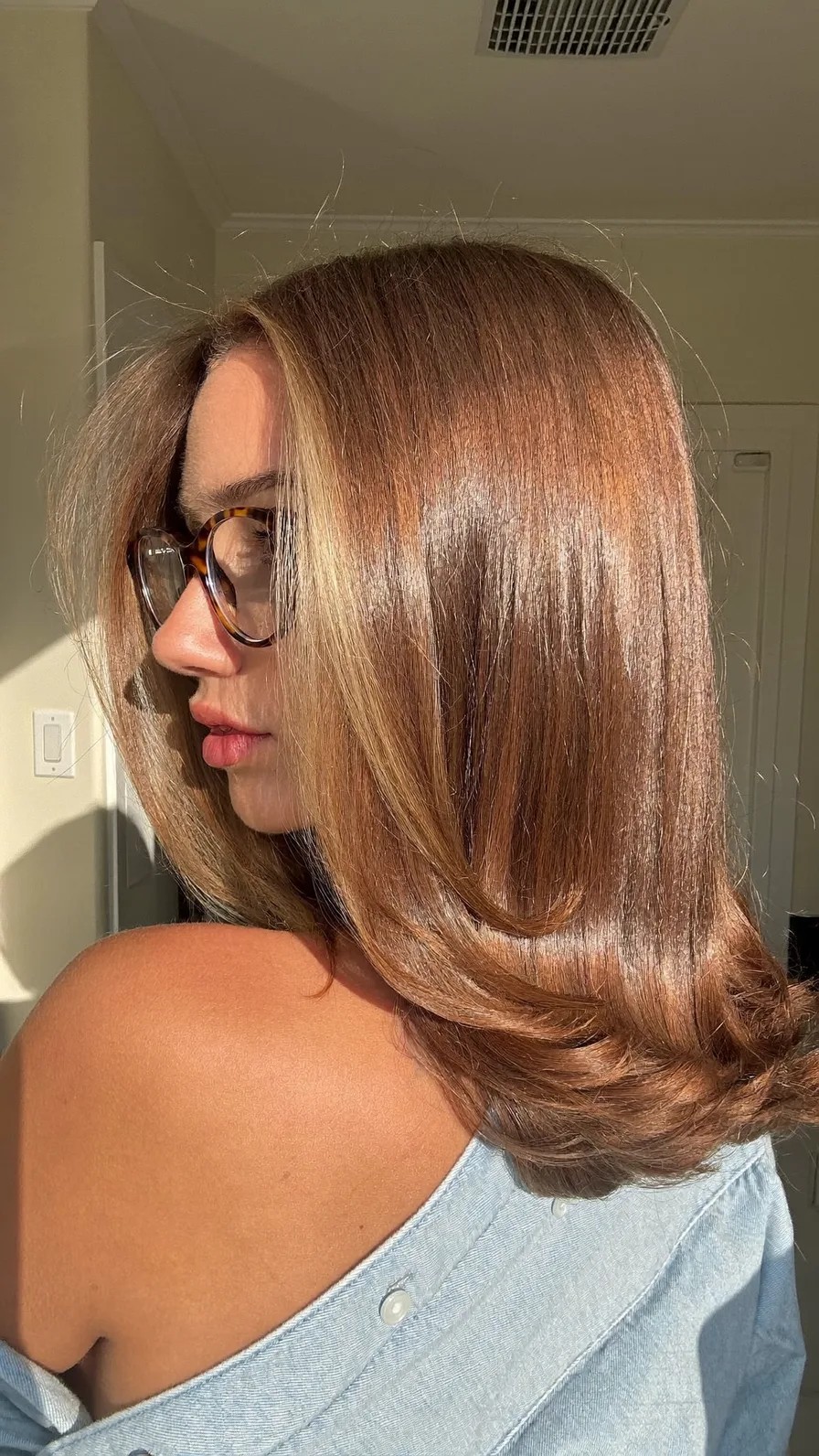 Soft Flowing Shoulder-Length Layers with Warm Caramel Balayage