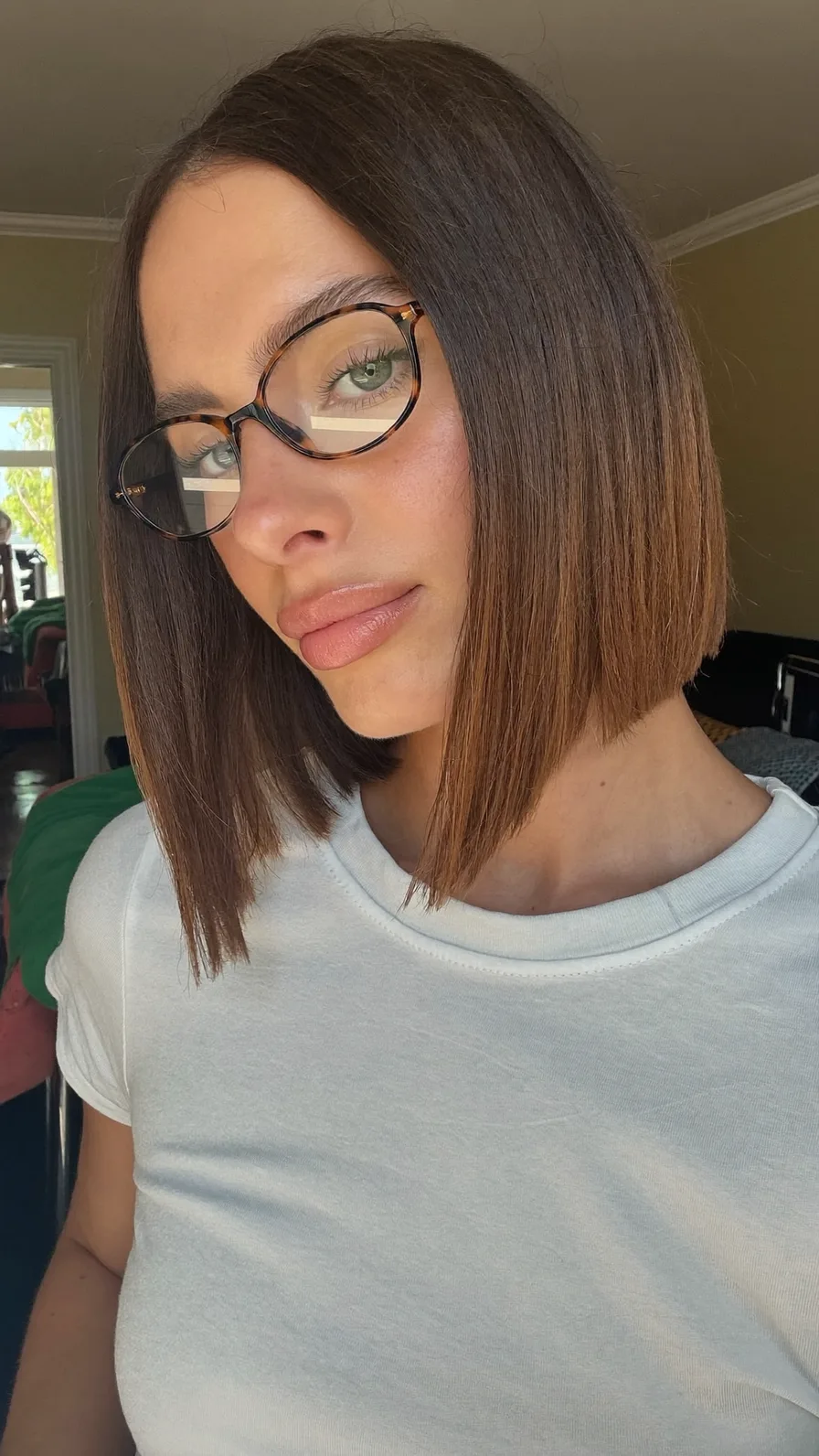 Sleek Center-Parted Blunt Cut Lob with Caramel Balayage
