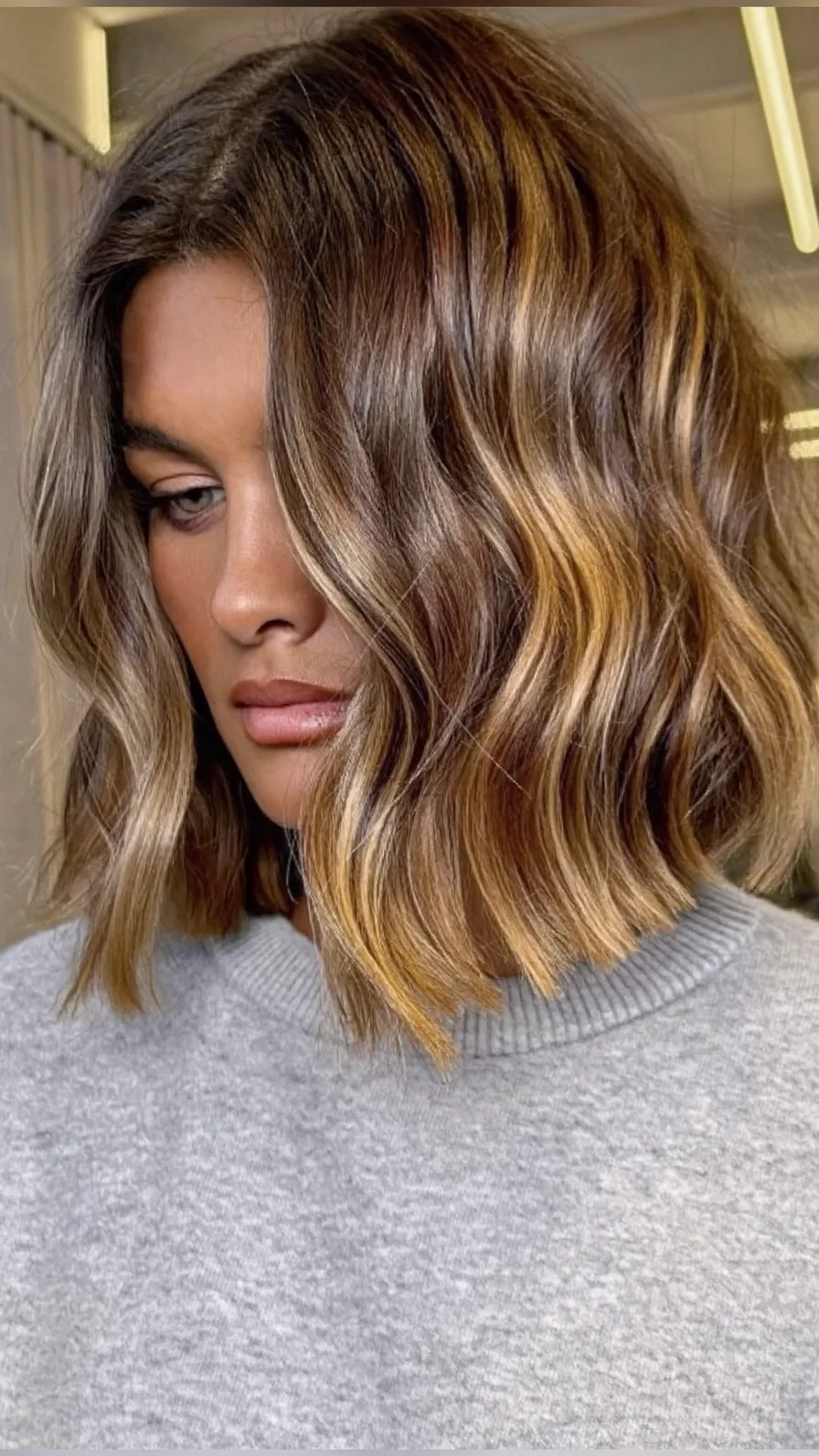Chic Warm Caramel Balayage Lob with Soft Waves