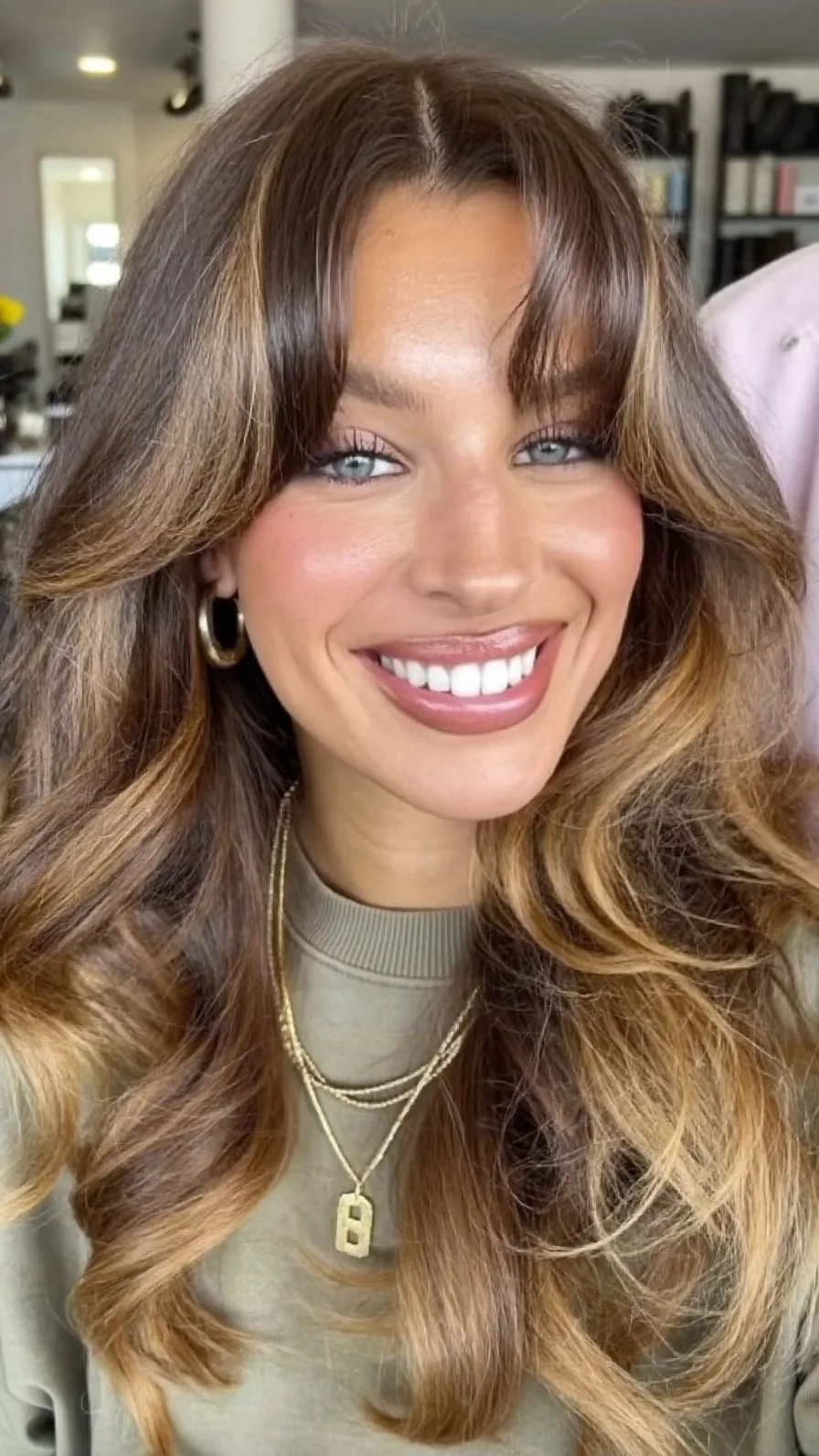 Voluminous Long Layers with Soft Curtain Bangs and Balayage Highlights