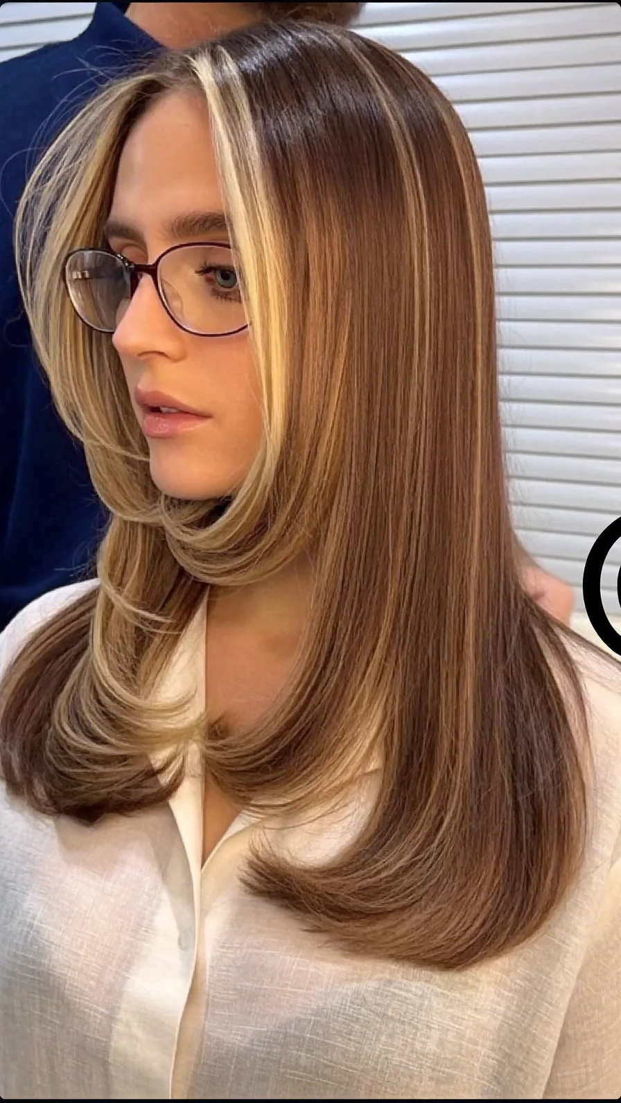 Sleek Long Layered Hair with Platinum Blonde Money-Piece Highlights