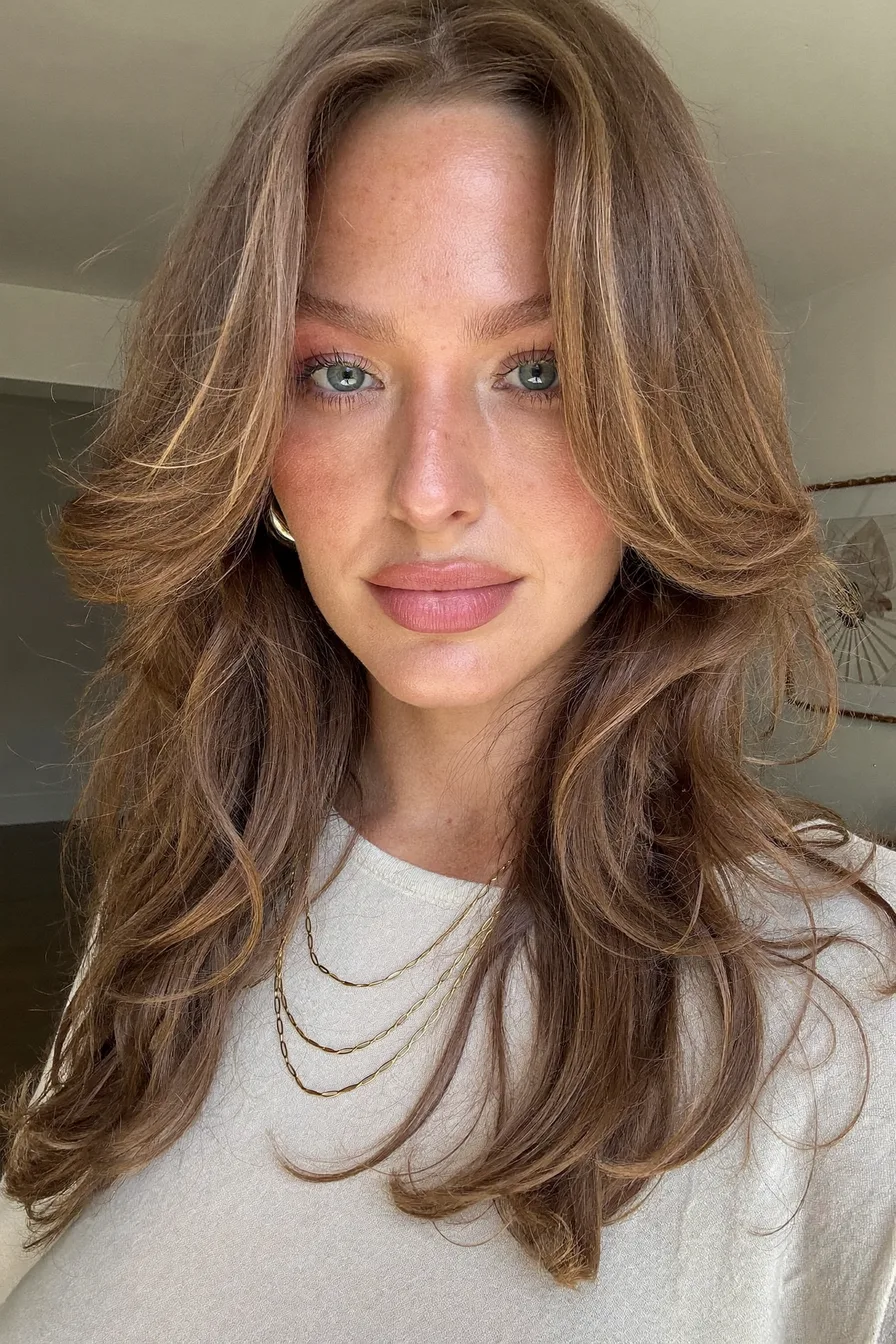 Voluminous Long Layered Hair with Soft Curtain Bangs