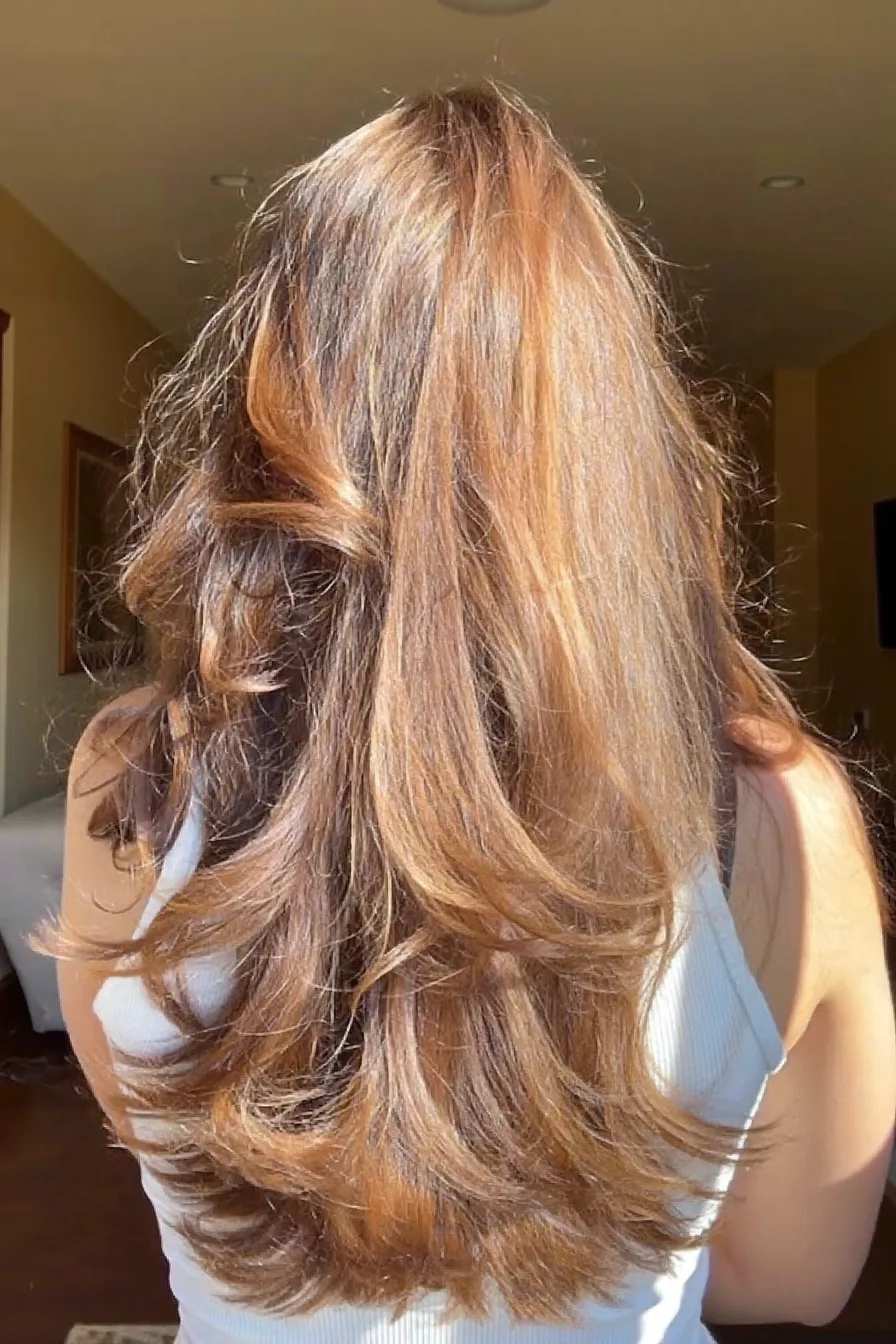 Soft Flowing Long Layers with Warm Caramel Balayage Highlights