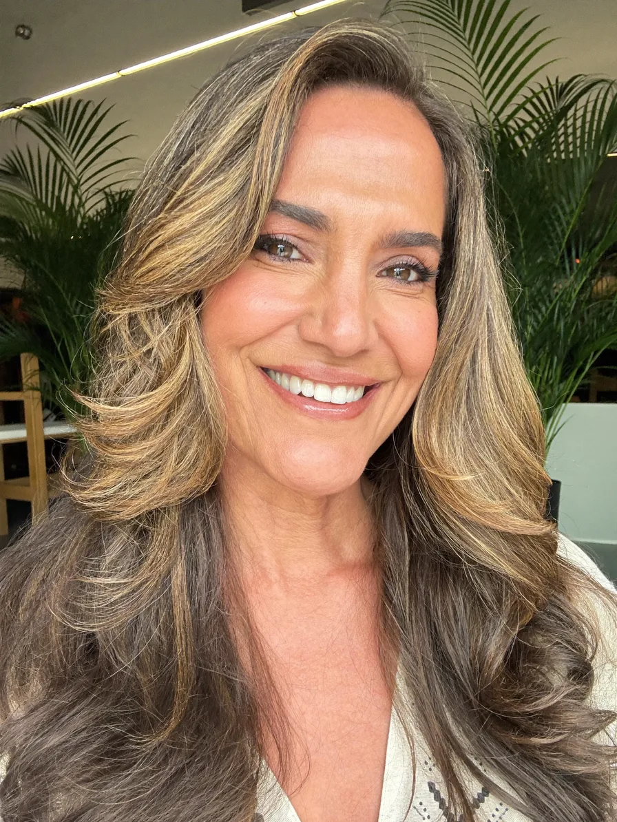 Voluminous Layered Long Hair with Warm Caramel Balayage Highlights