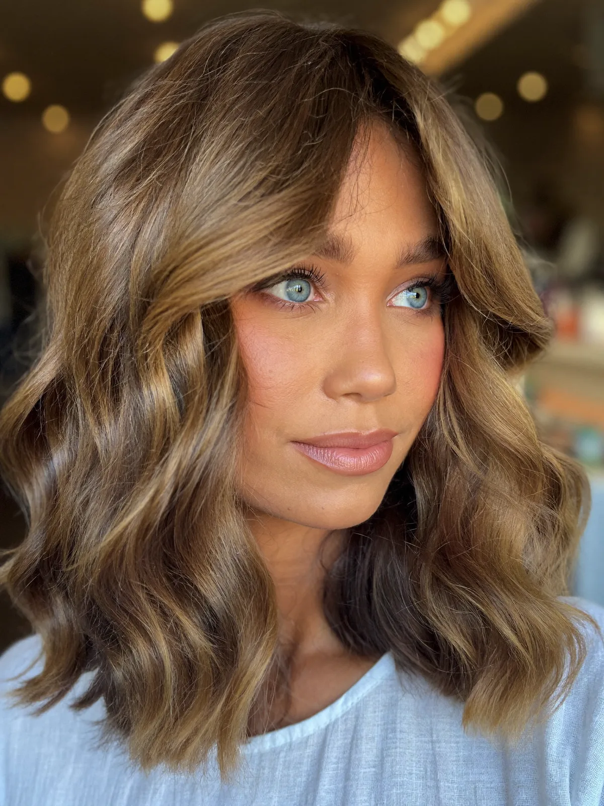Soft Wavy Caramel Brown Lob with Curtain Bangs