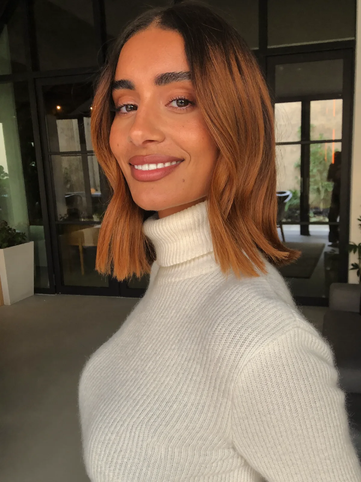 Sleek Caramel Brown Blunt Bob with Soft Center Part