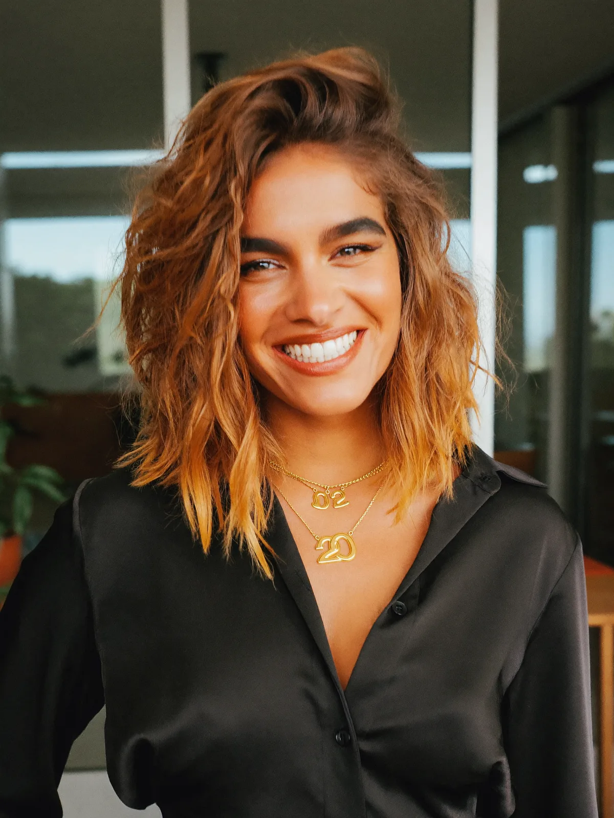 Textured Caramel Brown Wavy Bob with Volume and Definition