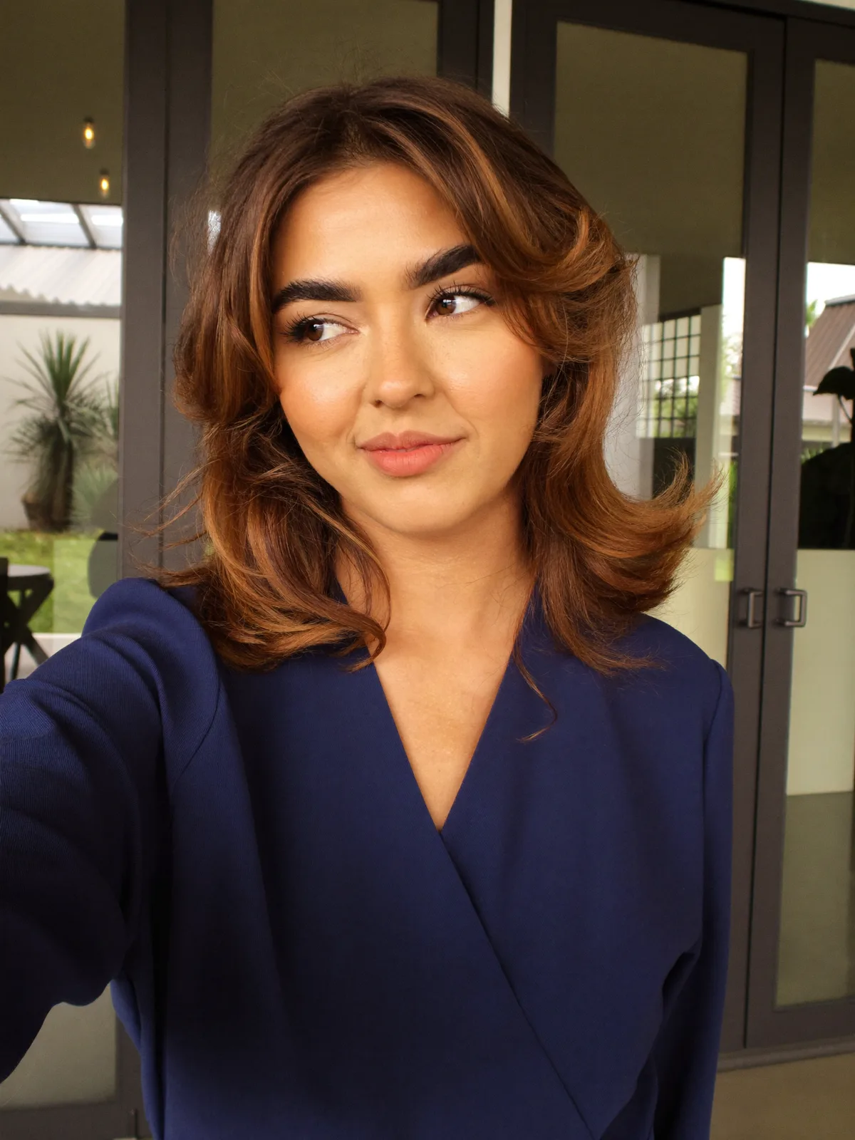 Soft Layered Bob with Warm Caramel Brown Curtain Bangs