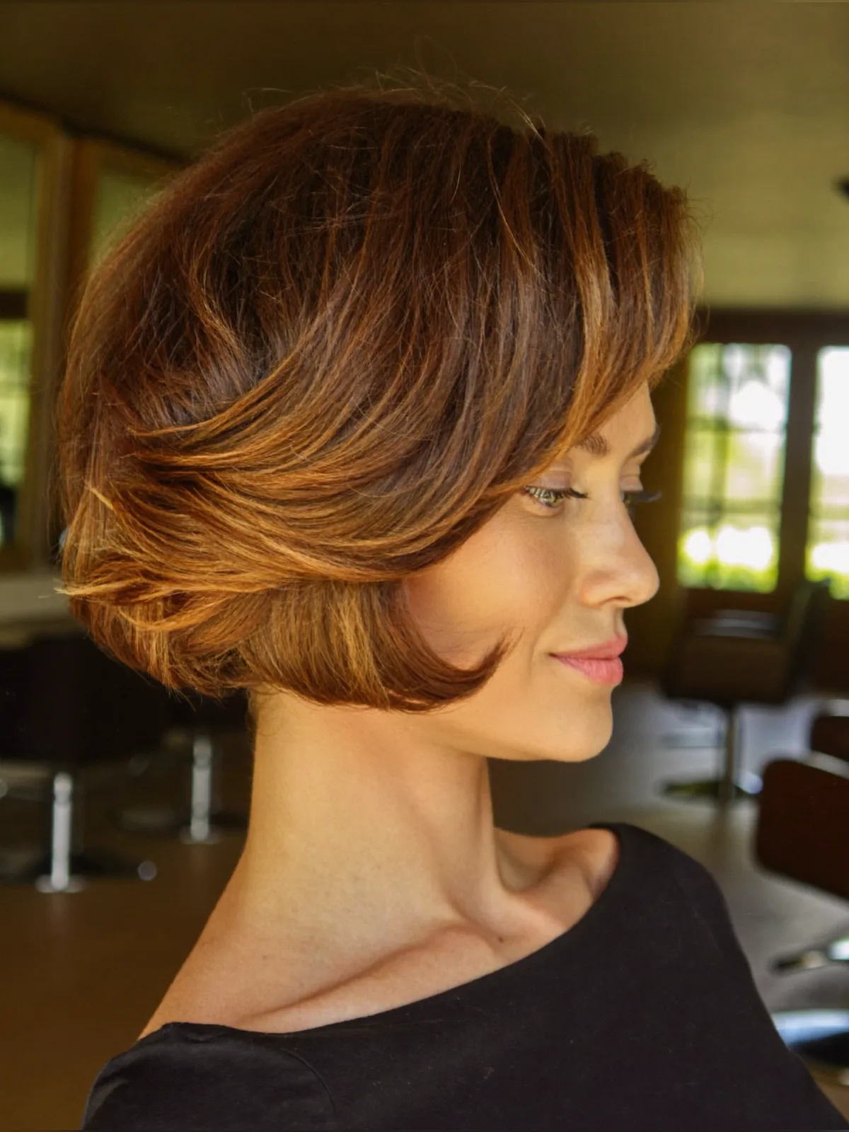 Voluminous Caramel Brown Stacked Bob with Face-Framing Layers