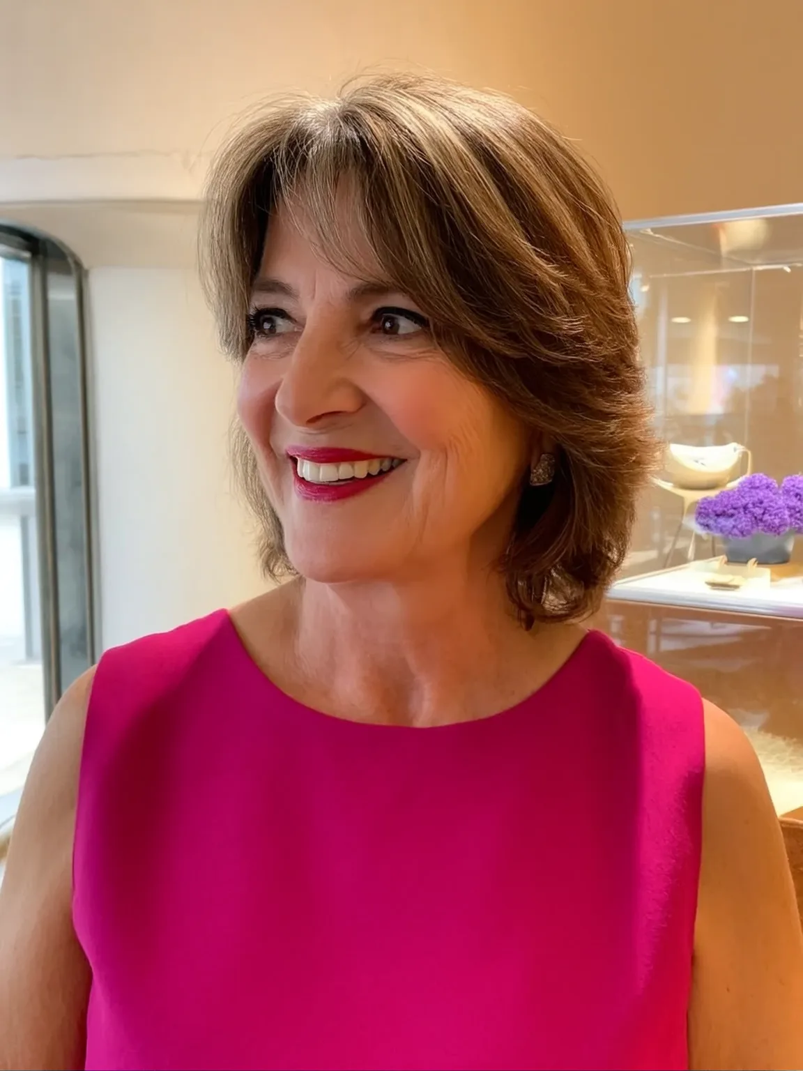 Chin-Length Feathered Waves with Side-Swept Bangs