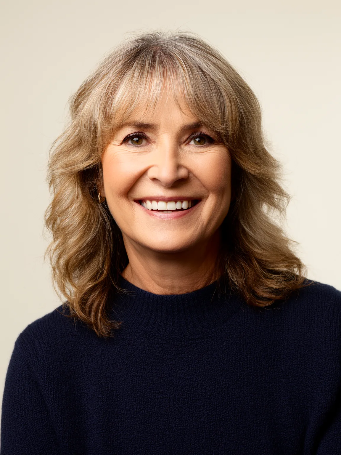 Textured Shoulder-Length Layers in Warm Caramel Blonde