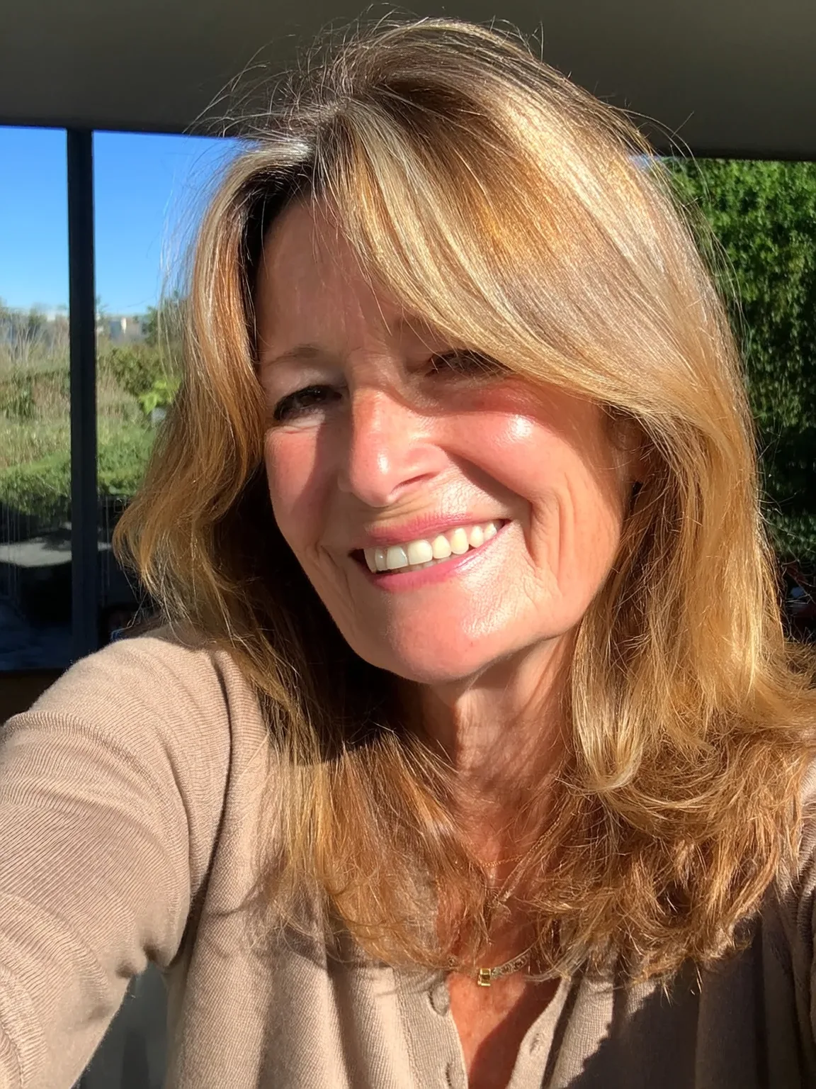 Shoulder-Length Layered Cut with Warm Caramel Blonde