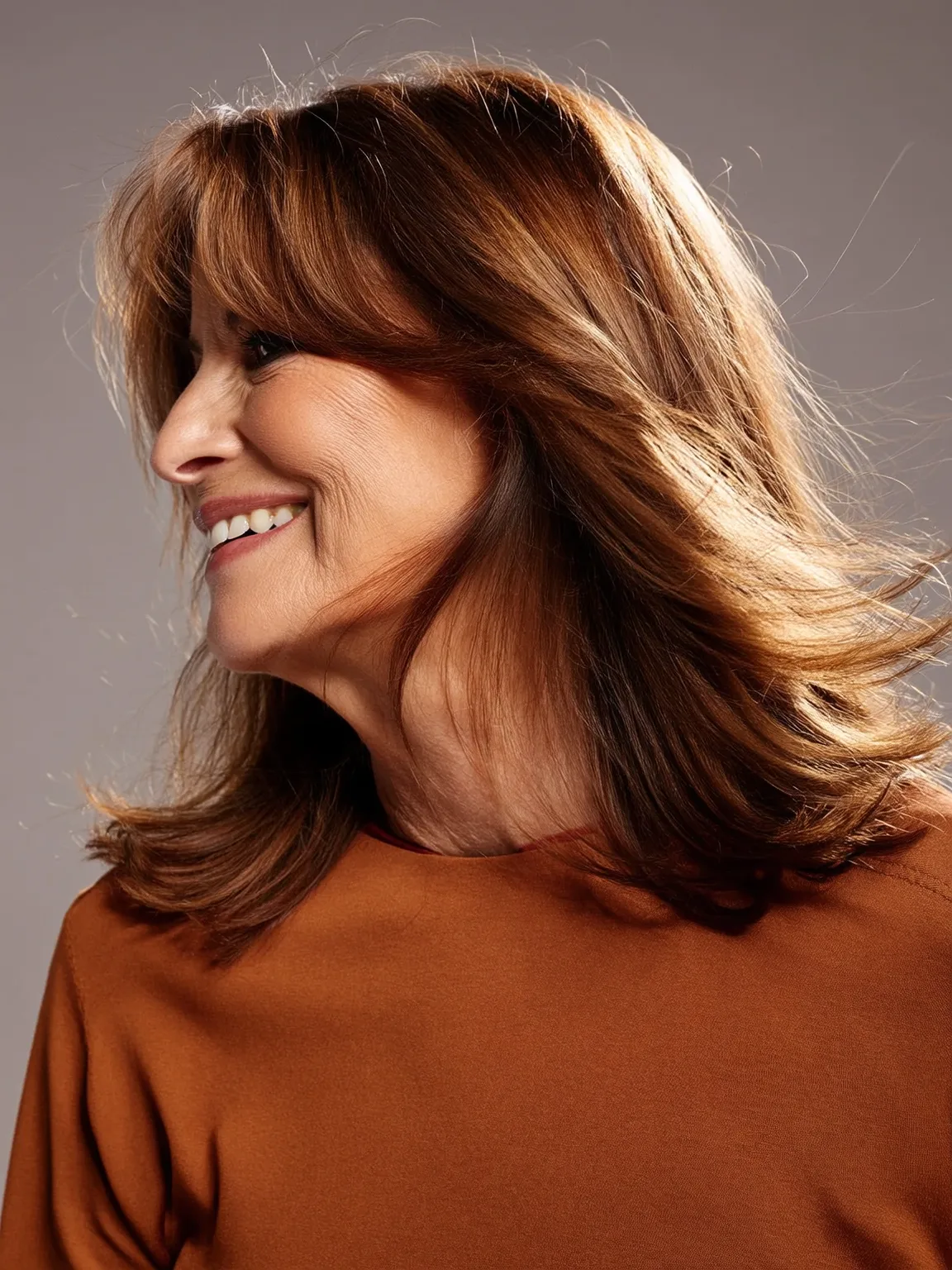 Flowing Shoulder-Length Layers in Warm Caramel Brown