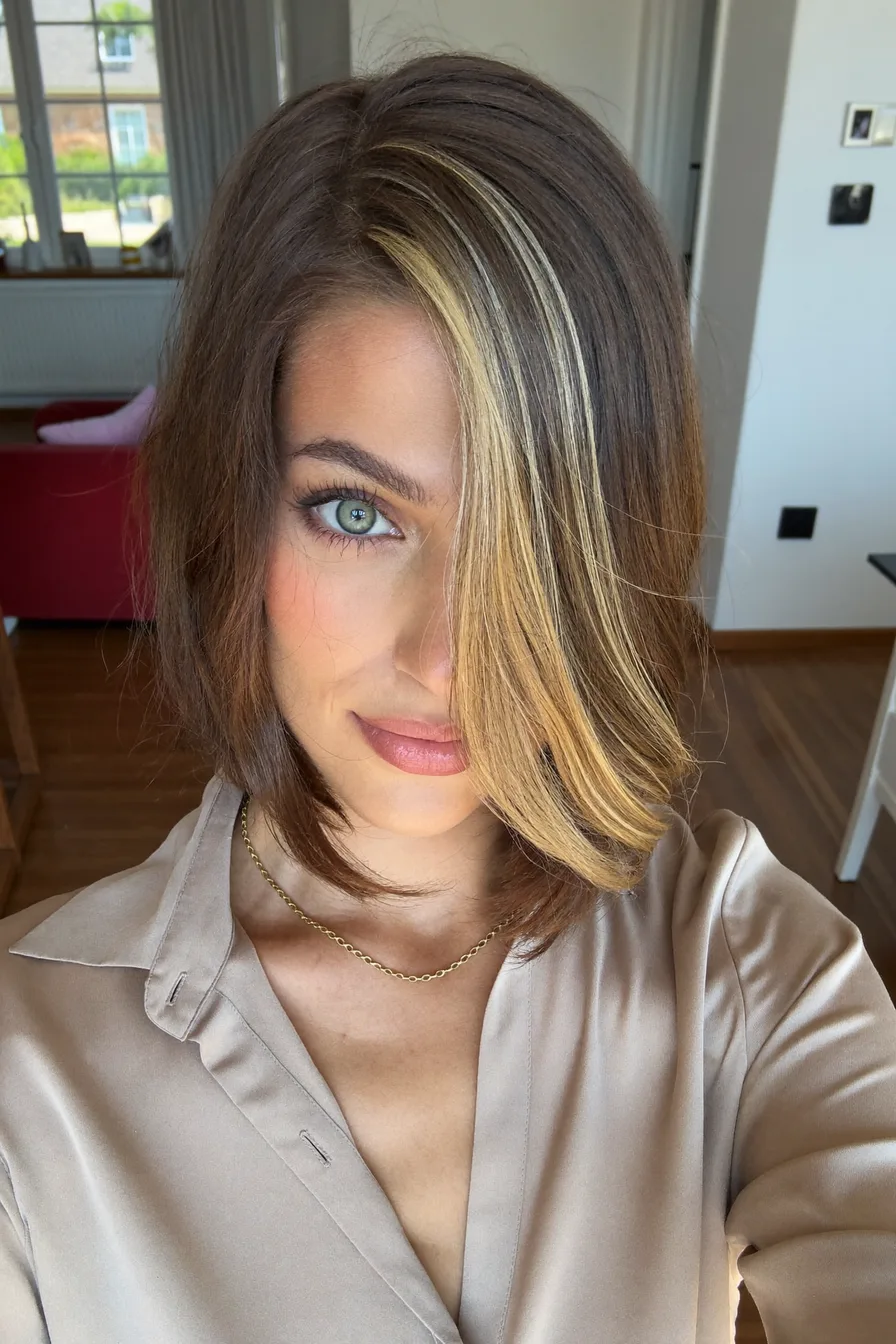 Chic Chin-Length Bob with Honey Blonde Side Highlights