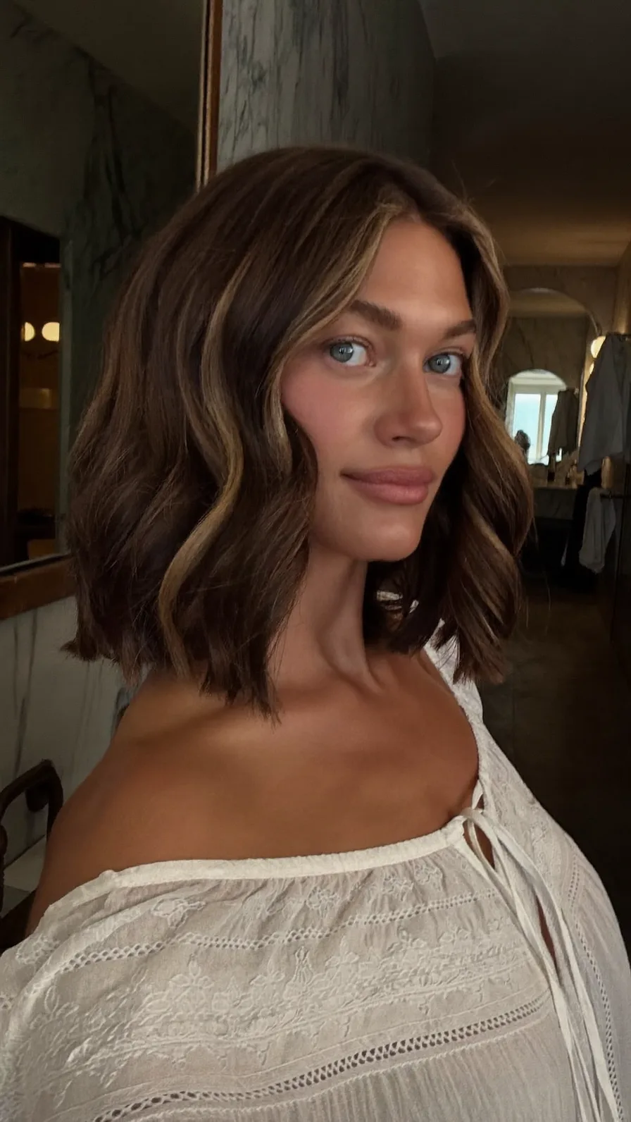Flowing Chin-Length Bob with Balayage Curtain Bangs
