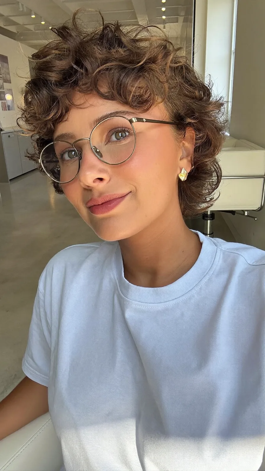 Voluminous Curly Bob with Textured Curtain Bangs Hairstyle
