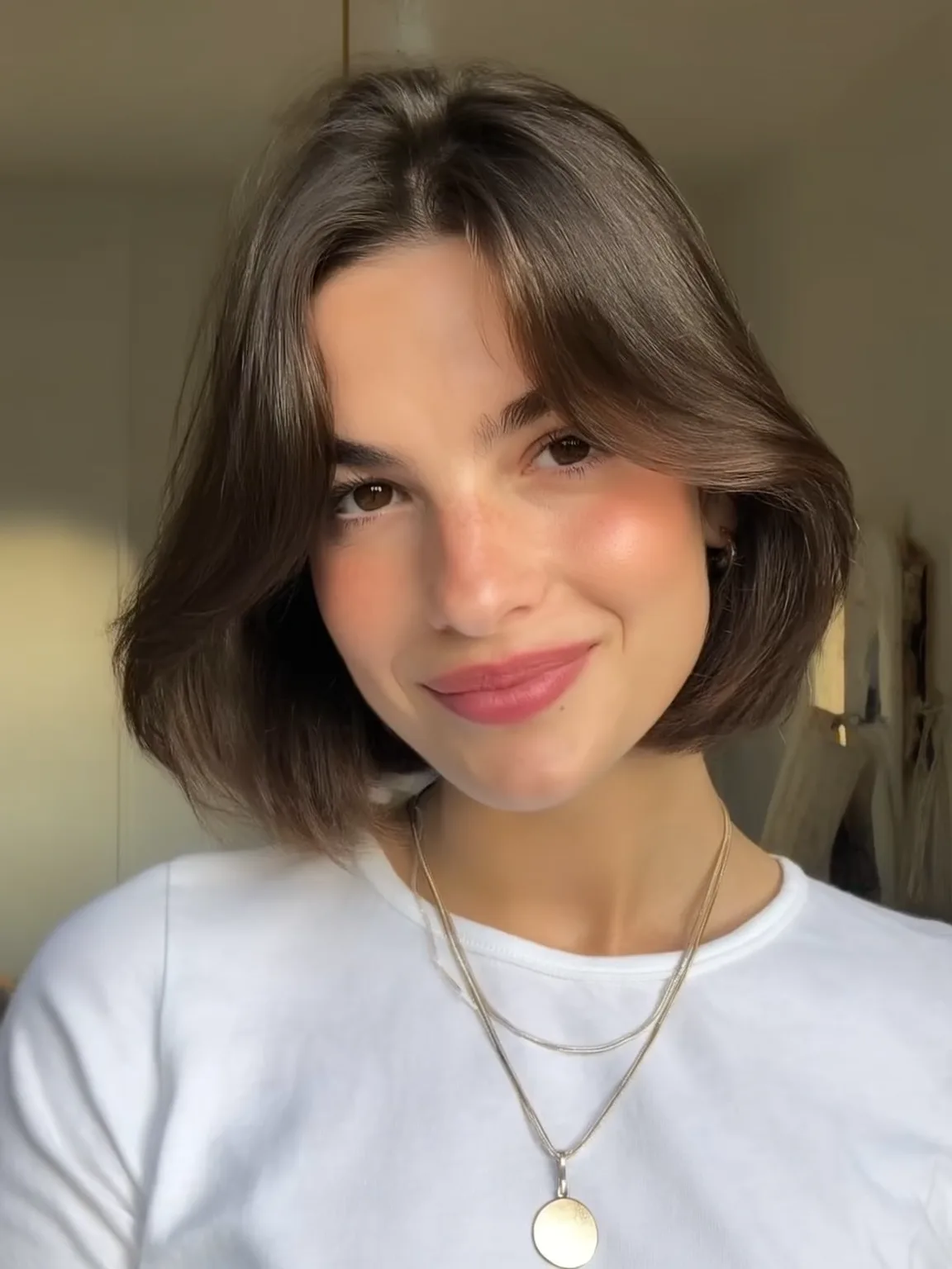 Classic Chin-Length Bob with Curtain Bangs in Chestnut Brown