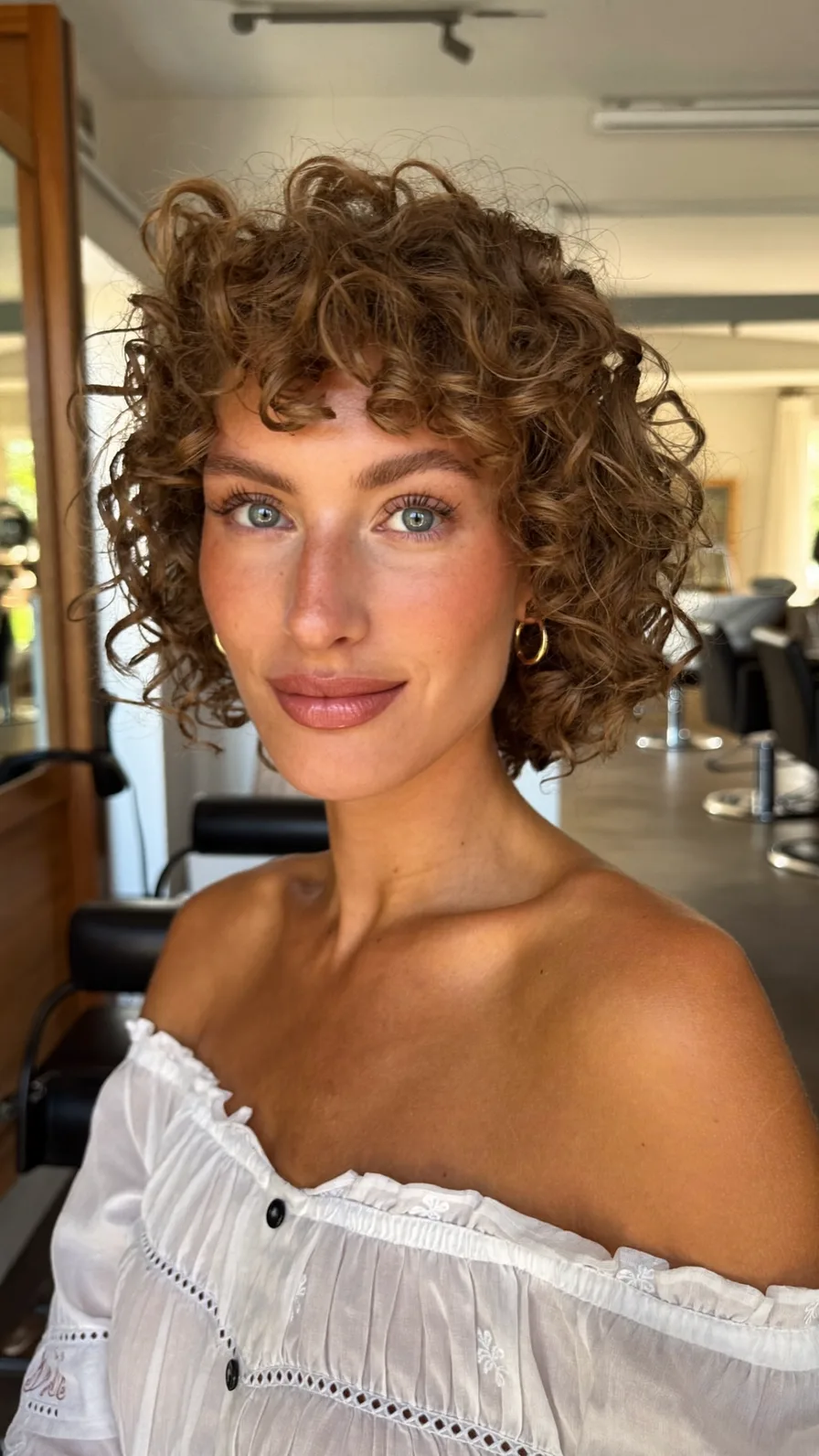 Voluminous Curly Short Bob with Textured Curtain Bangs