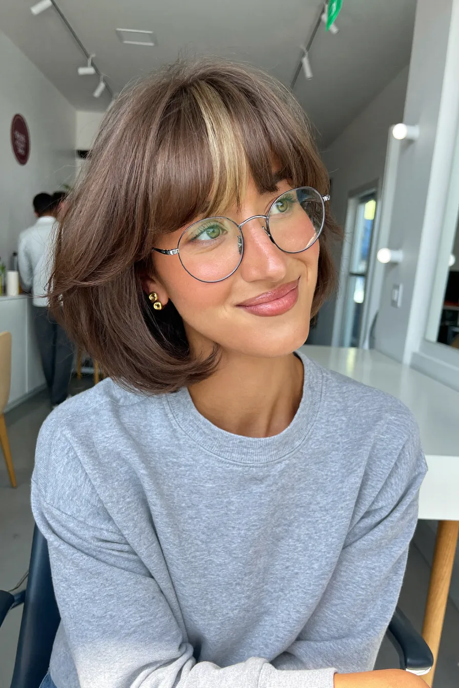 Chin-Length Brown Bob with Blonde Money Piece Curtain Bangs