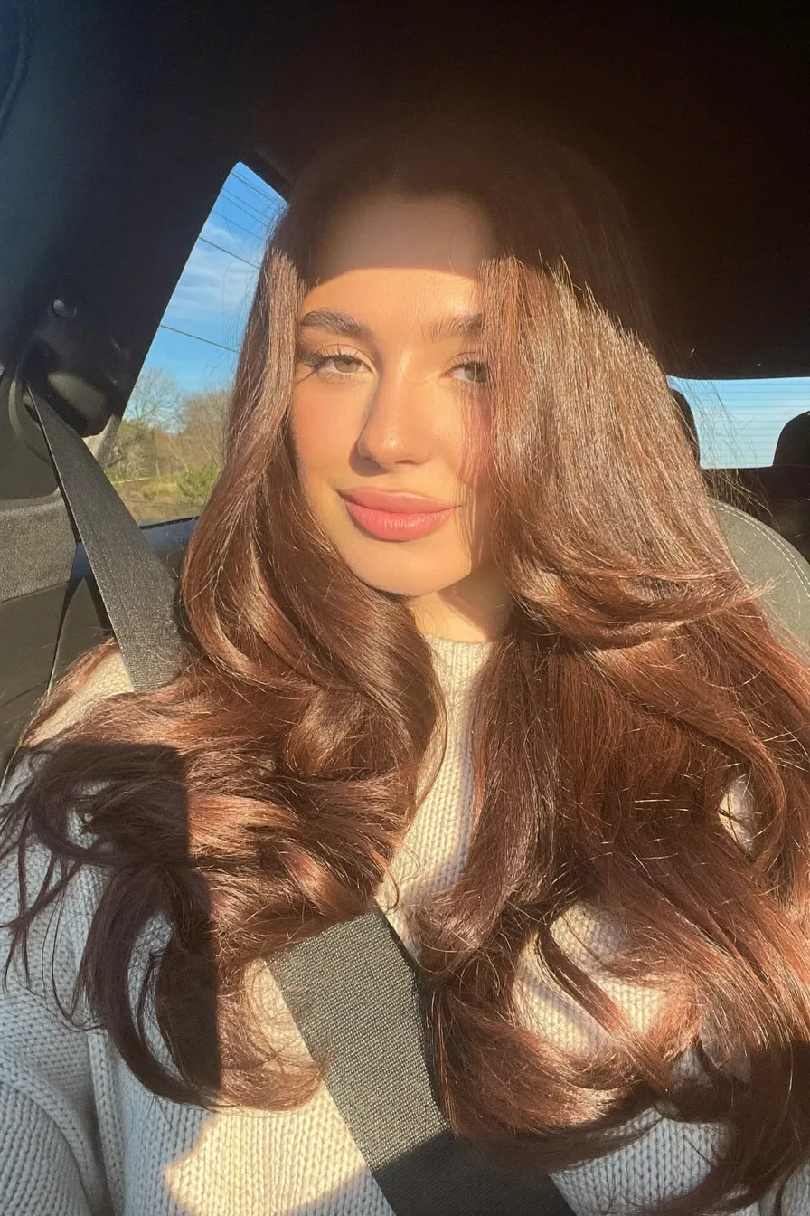 Voluminous Warm Chestnut Brown Long Layered Hairstyle