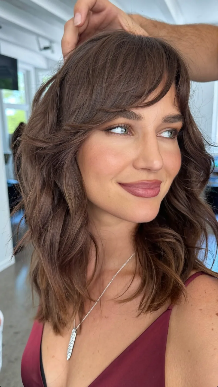 Soft Layered Shoulder-Length Hair with Curtain Bangs