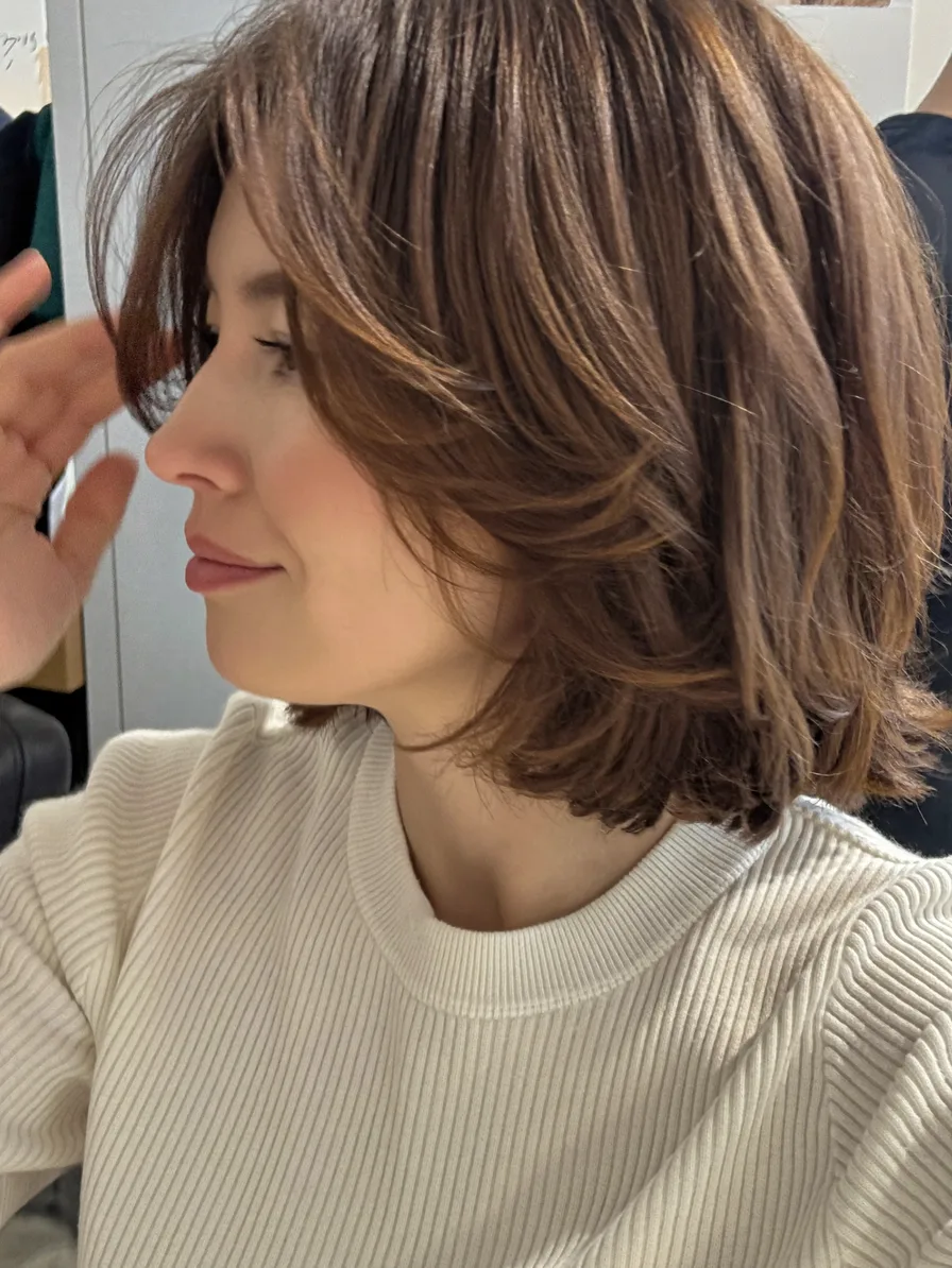 Shoulder-Length Layered Lob with Curtain Bangs and Babylights