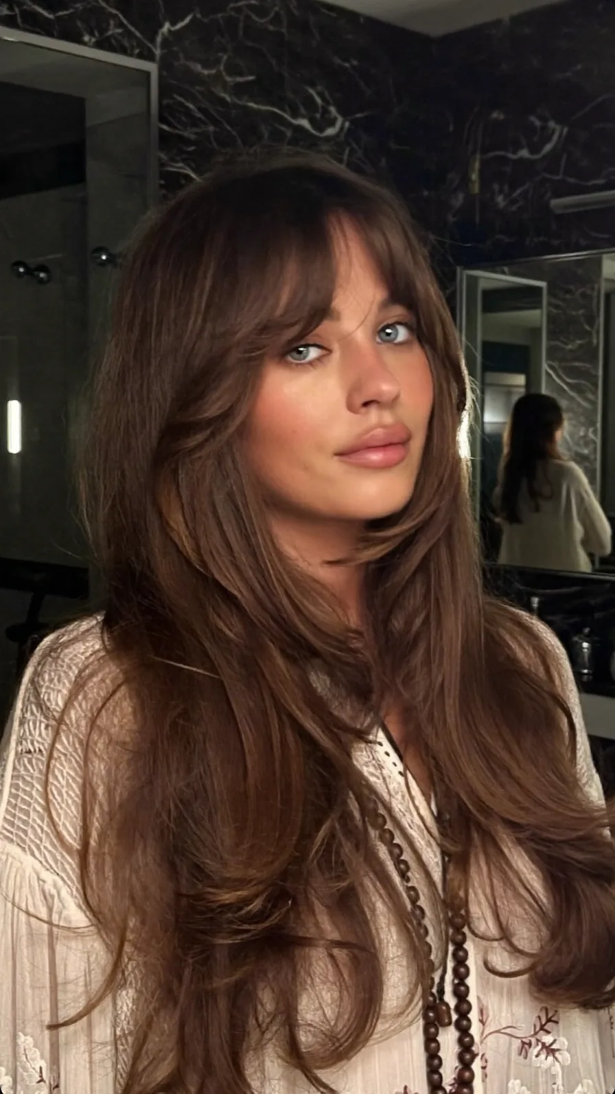 Long Layered Chestnut Hair with Soft Curtain Bangs Style