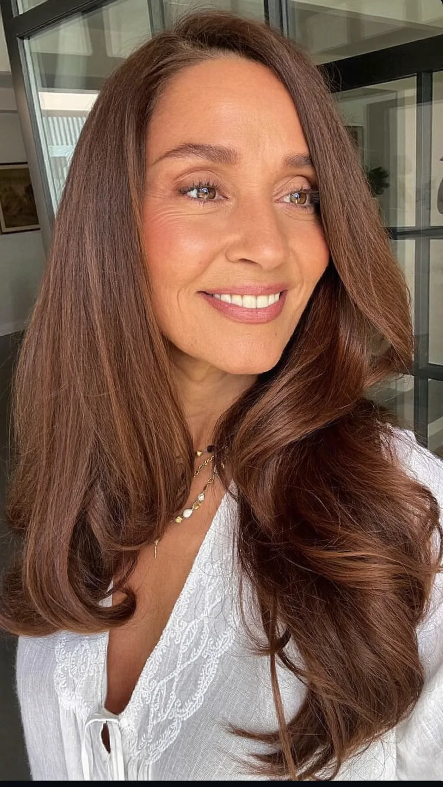 Elegant Long Layers with Soft Flicked Ends and Side Part