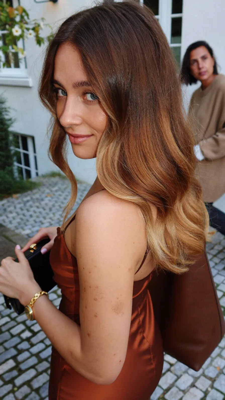 Soft Long Layers with Warm Balayage and Center Curtain Bangs