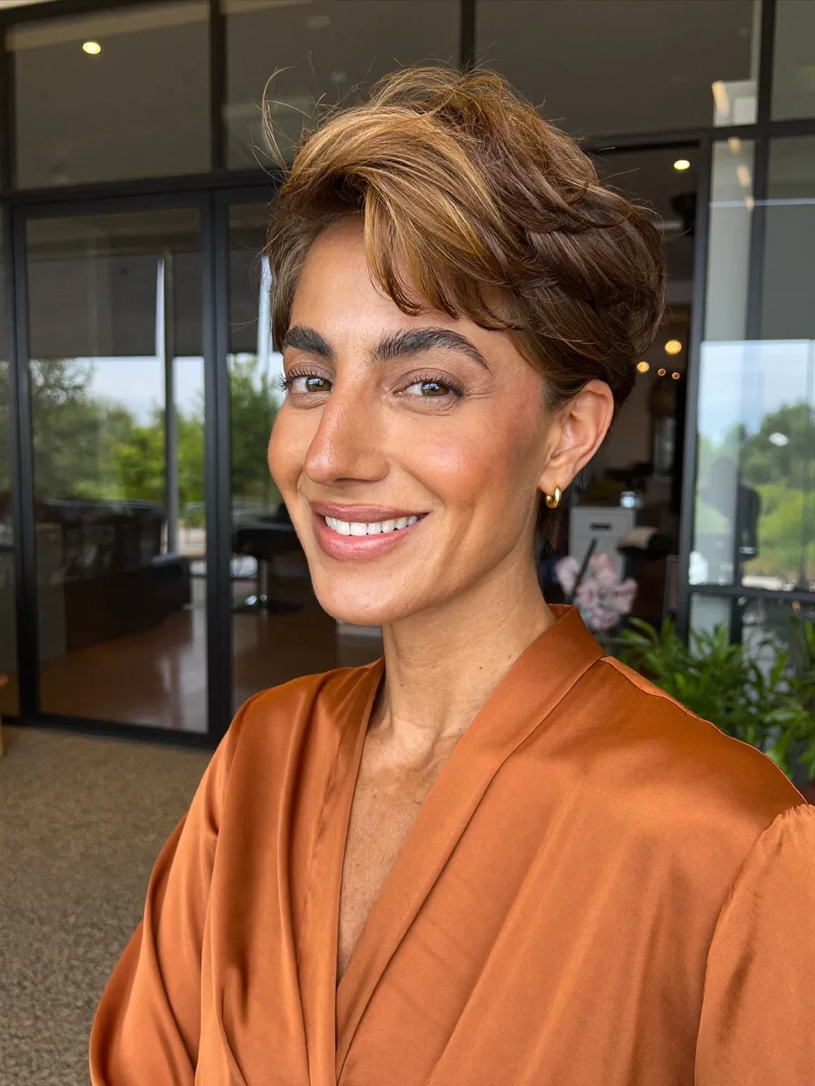 Voluminous Short Layered Pixie with Honey Blonde Babylights
