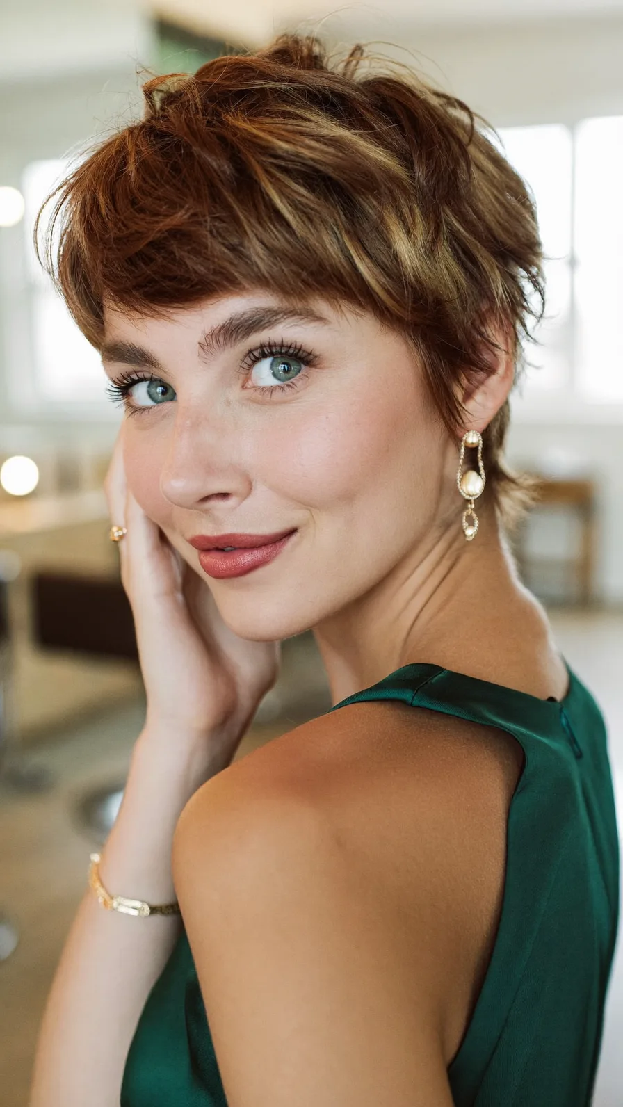 Textured Pixie Cut with Warm Honey Highlight Accents