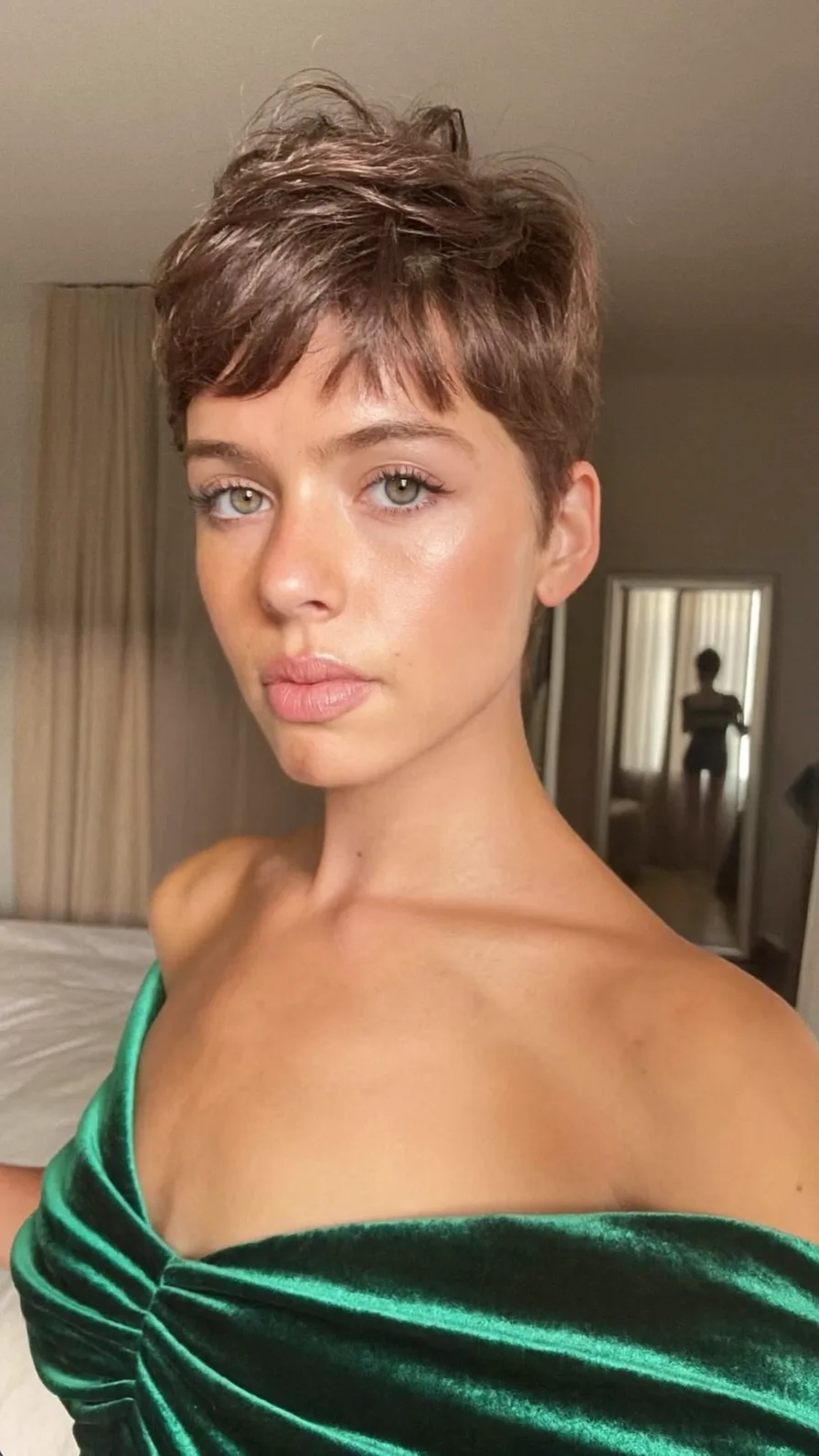 Textured Pixie Cut with Wispy Bangs and Chestnut Hue