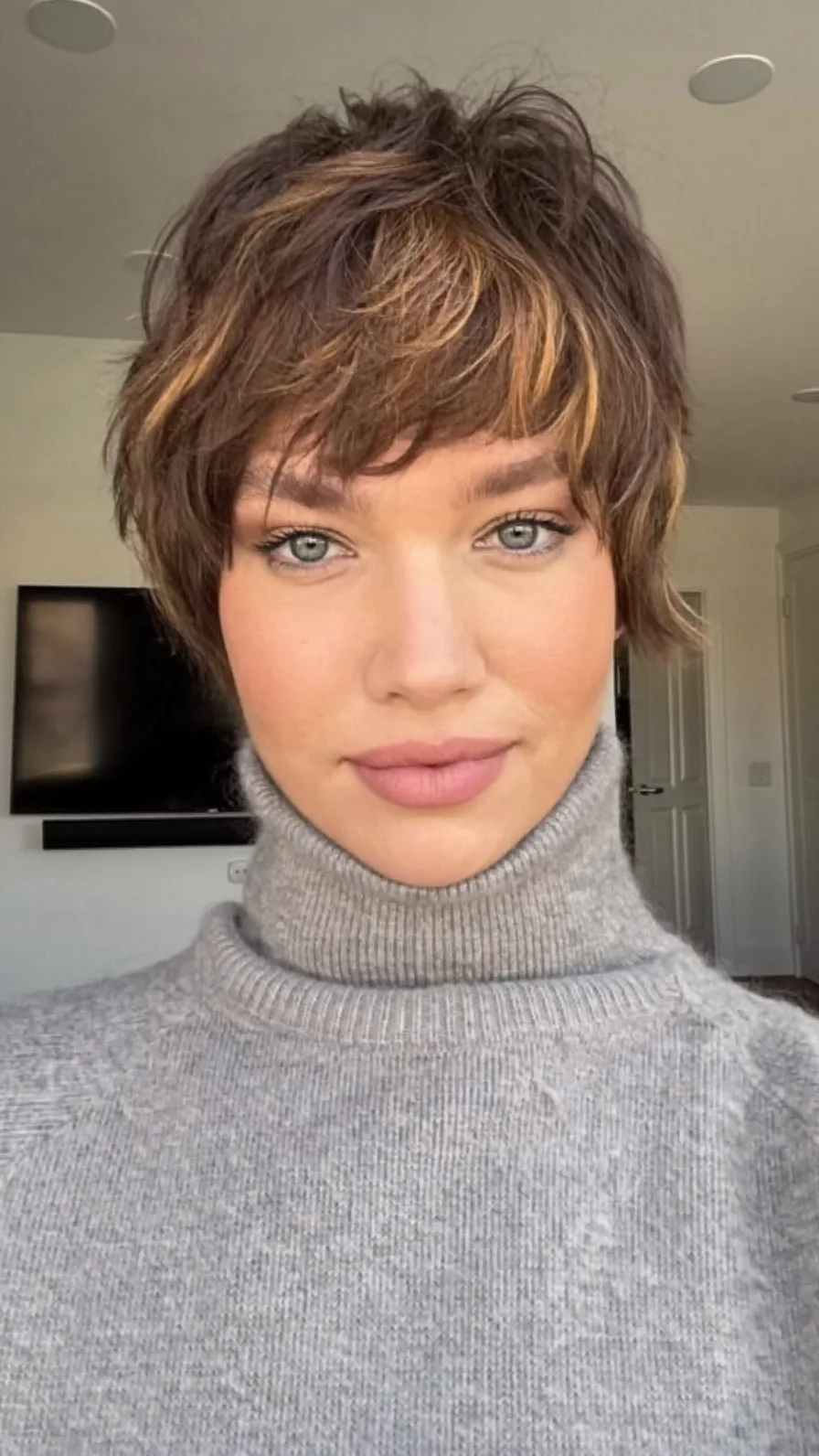 Modern Textured Pixie Cut with Honey Blonde Highlights