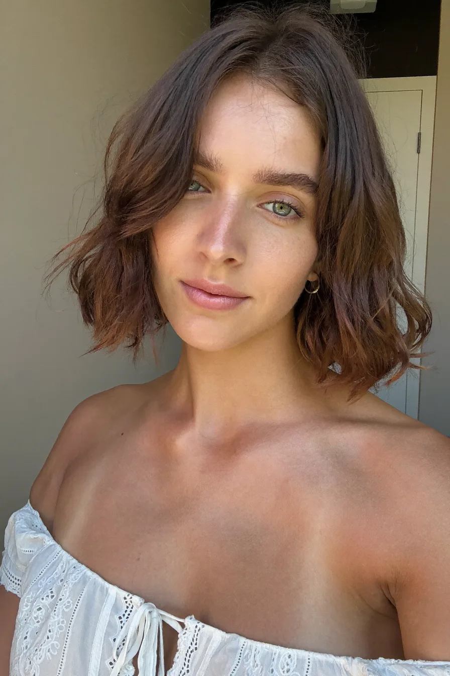 Textured Chin-Length Lob with Curtain Bangs and Natural Waves