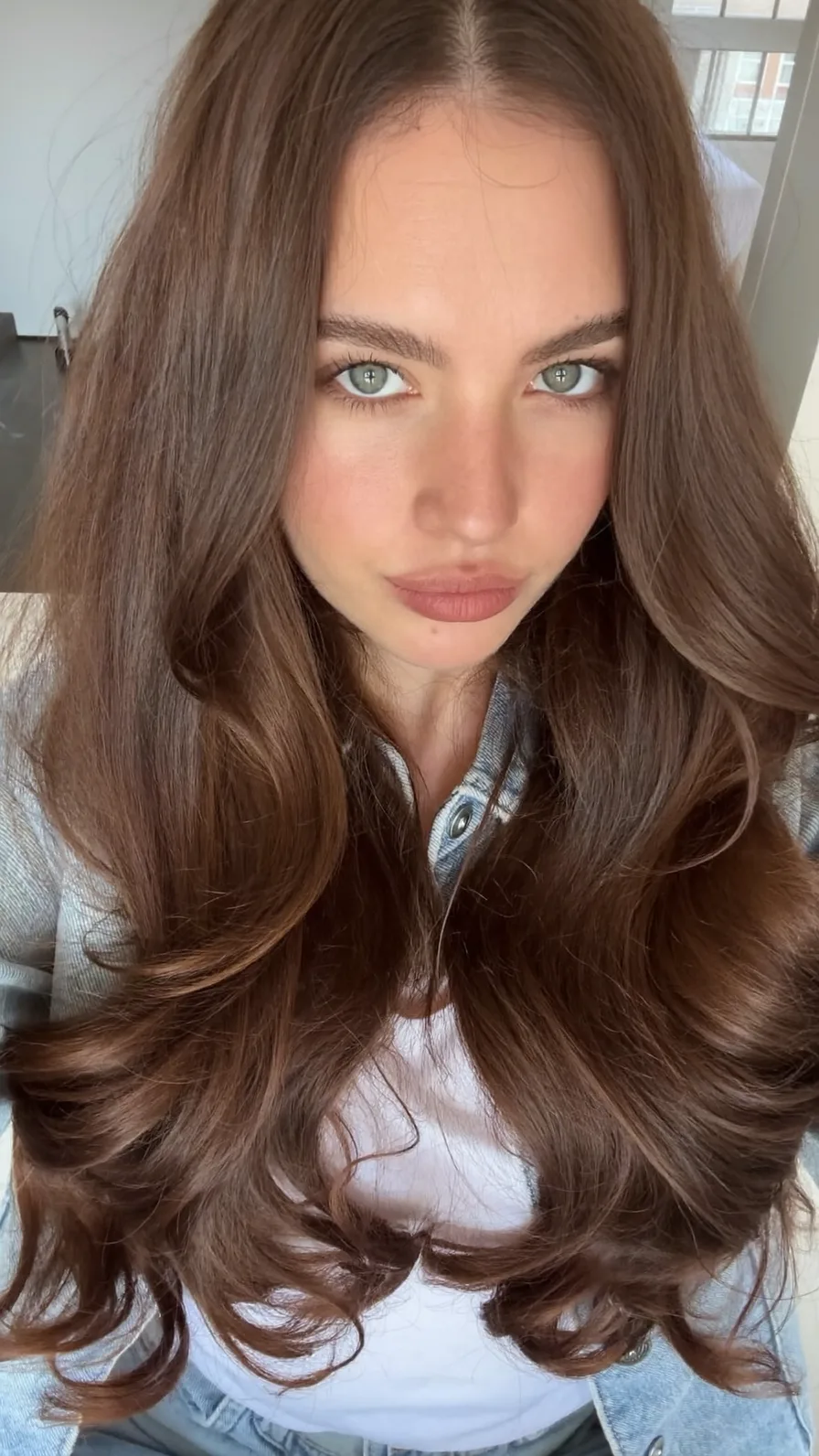 Voluminous Long Layers with Flowing Warm Chestnut Waves