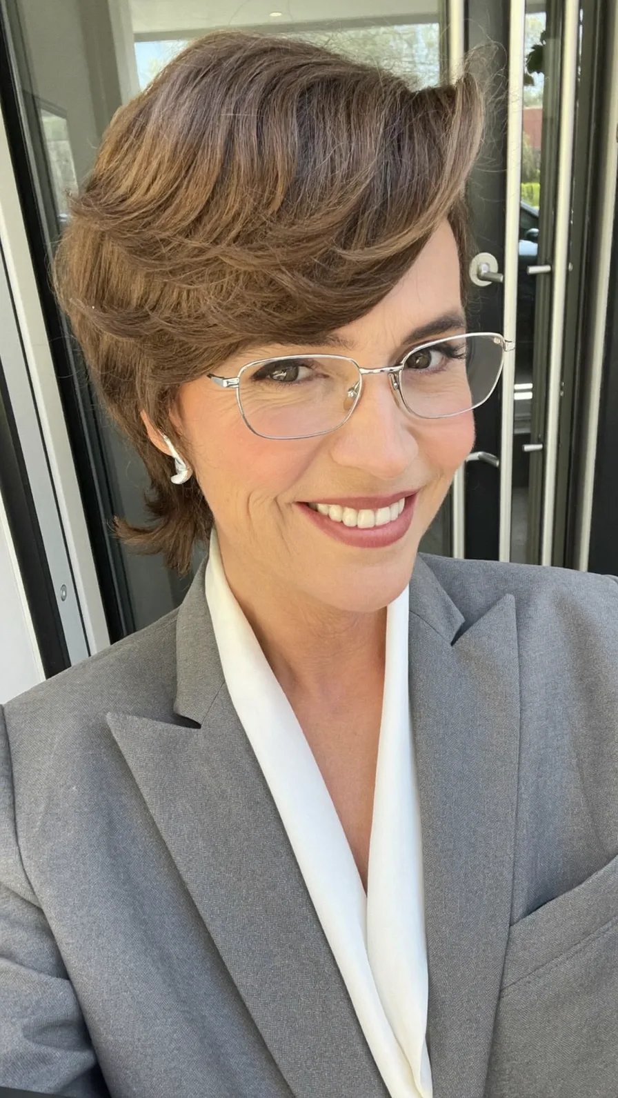 Elegant Chin-Length Layered Hairstyle with Side-Swept Bangs