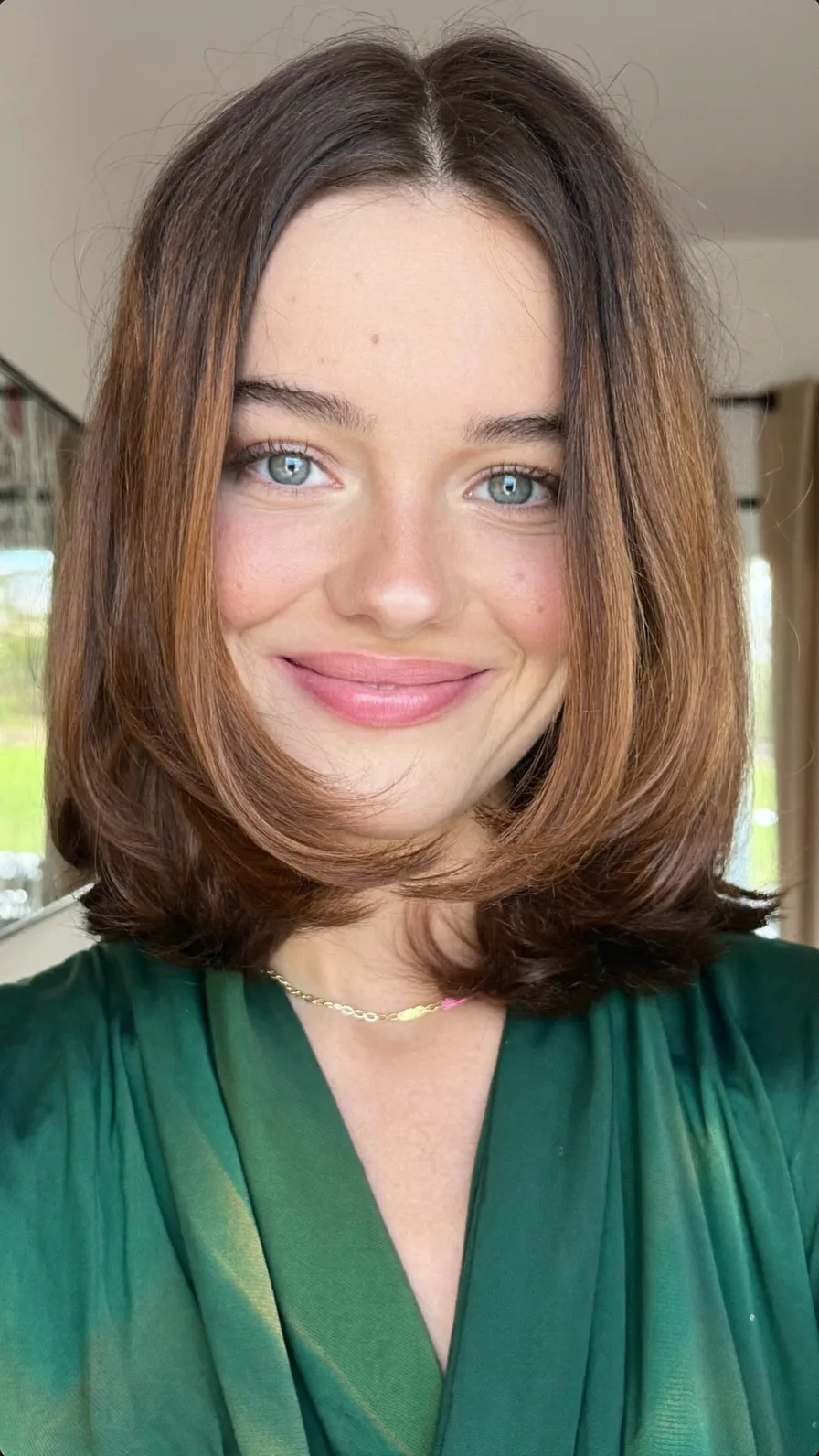 Modern Shoulder-Length Chestnut Brown Long-Layered Hairstyle