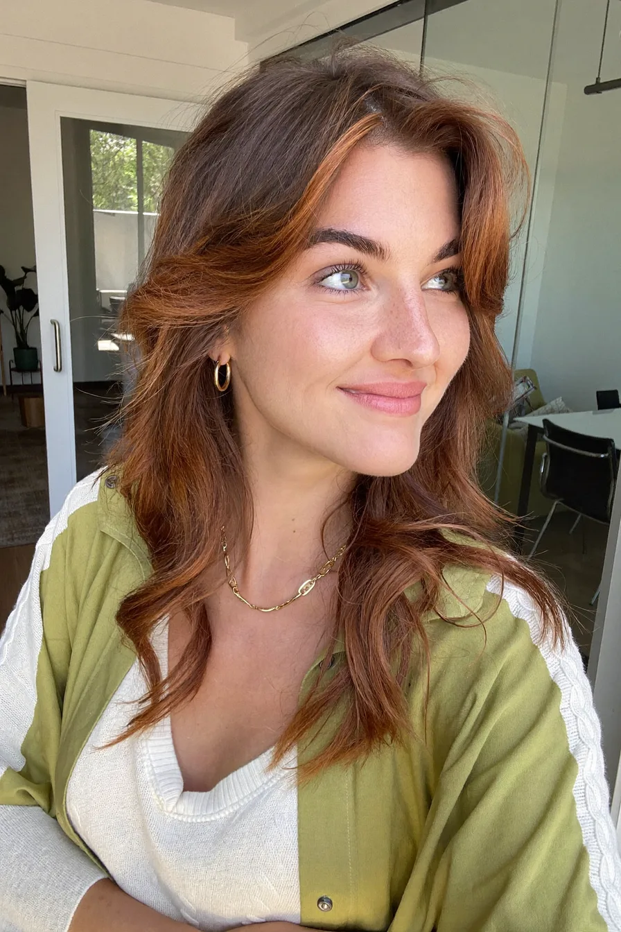 Modern Chestnut Layered Hair with Flowing Curtain Bangs