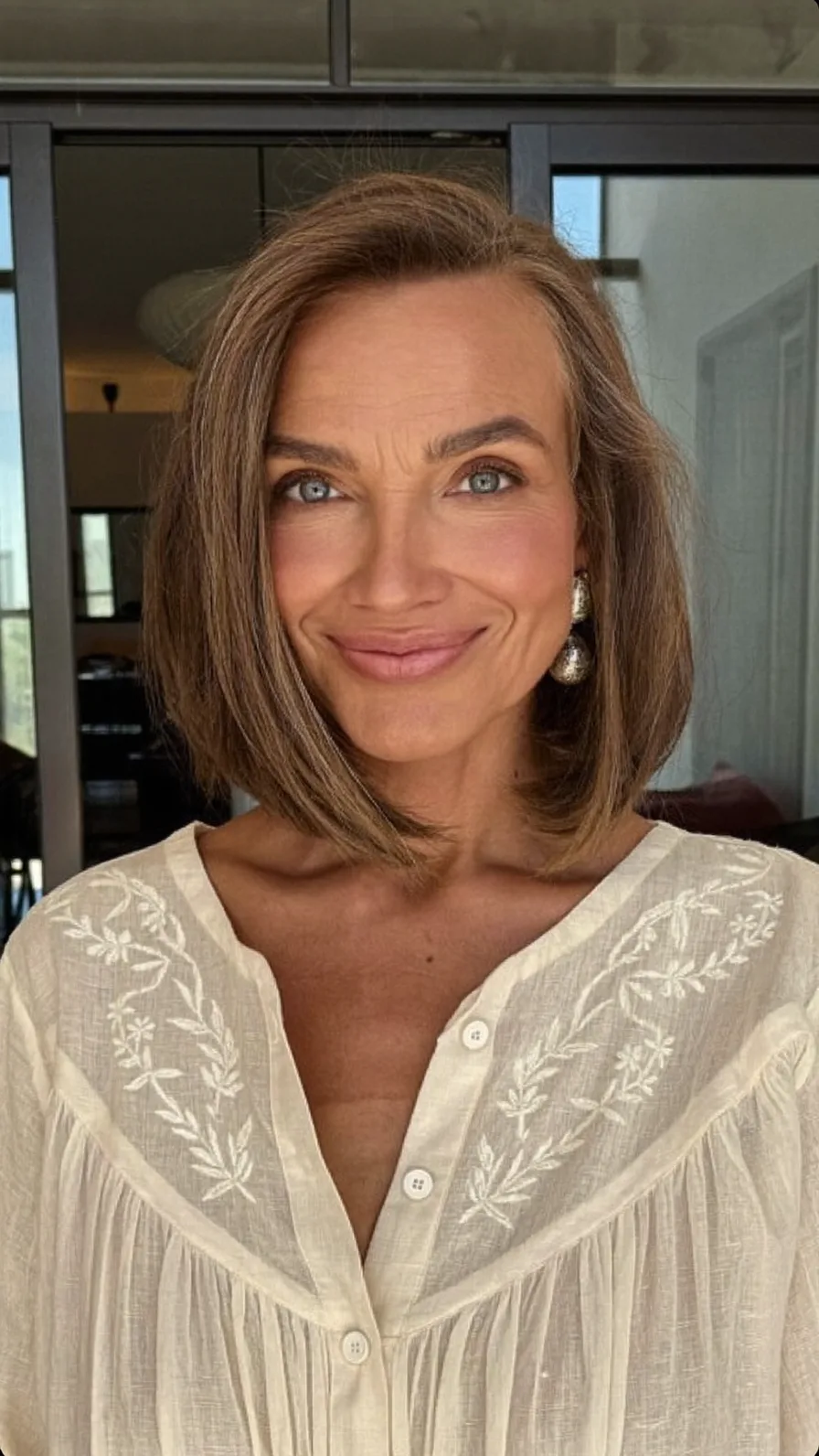 Elegant Chin-Length Blunt Bob with Natural Ash Highlights