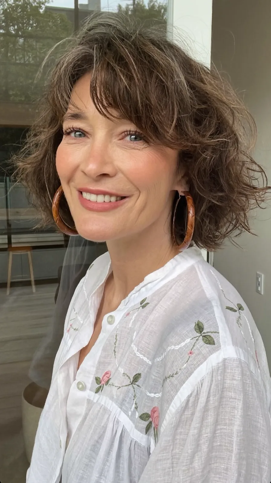 Choppy Layered Chin-Length Bob with Textured Curtain Bangs