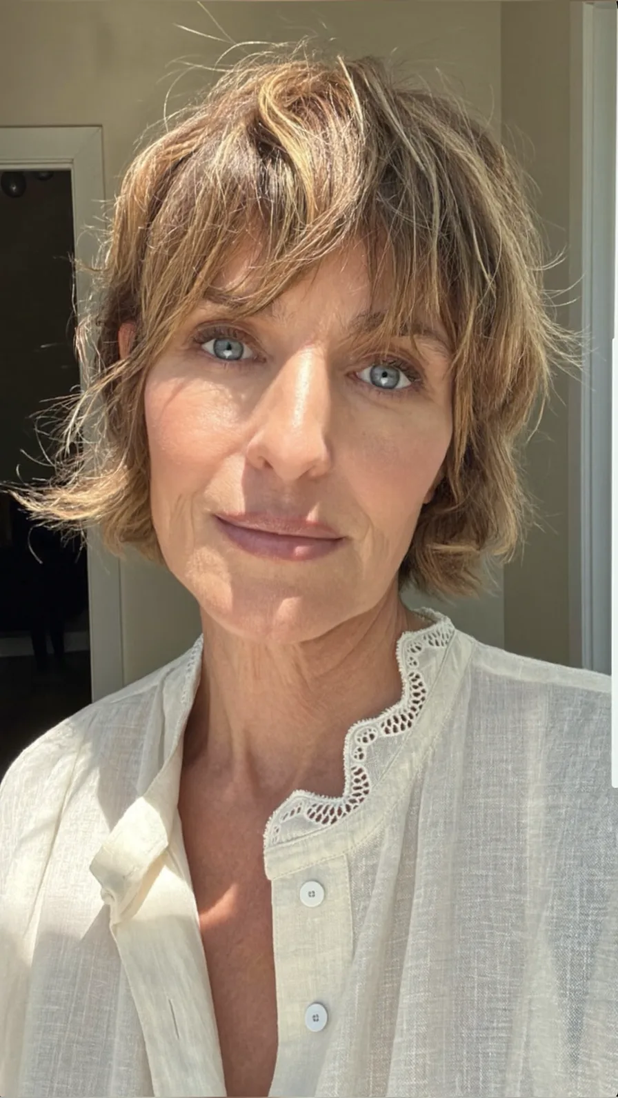 Textured Chin-Length Choppy Bob with Wispy Highlights