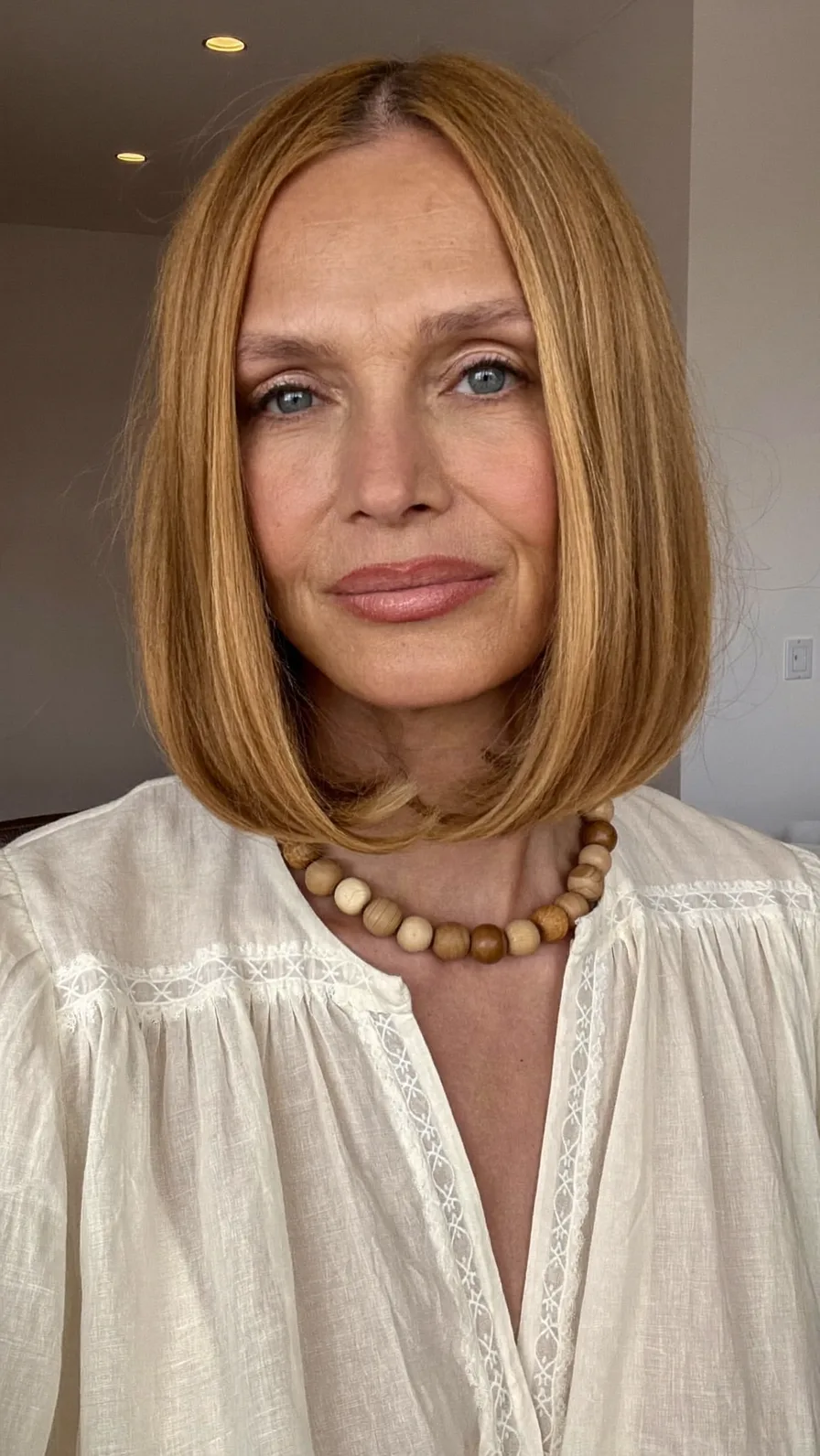 Classic Chin-Length Rounded Bob with Warm Honey Blonde