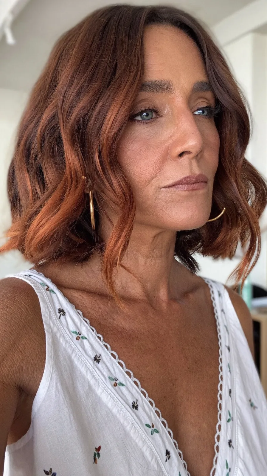 Modern Auburn LOB with Soft Waves and Balayage Highlights