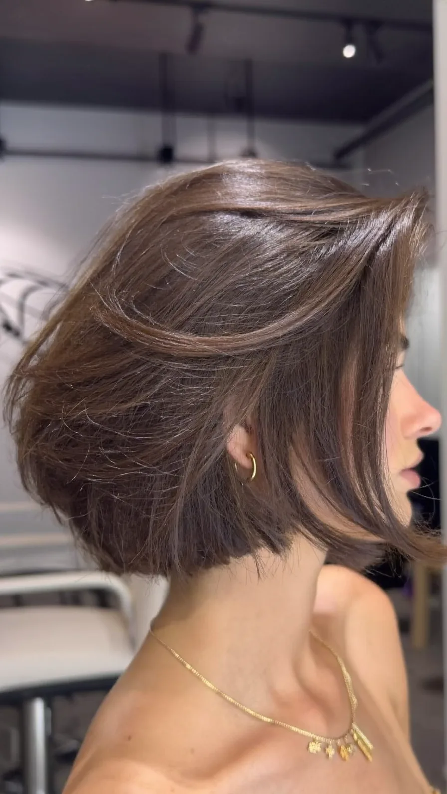 Voluminous Chin-Length Blunt Cut Bob with Side-Swept Bangs