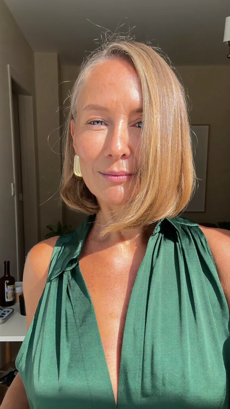 Sleek Deep Side Part Classic Blonde Chin-Length Bob