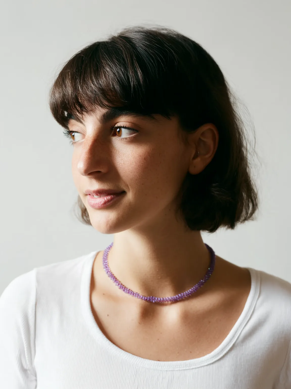 Chocolate Brown Bob with Blunt Bangs and Air-Dried Texture
