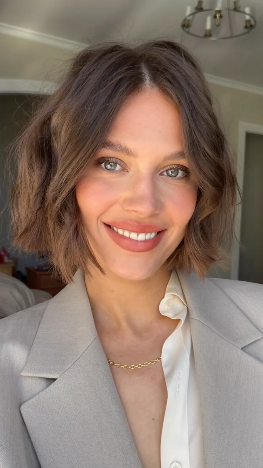 Chic Textured Chin-Length Bob with Center-Parted Long Bangs